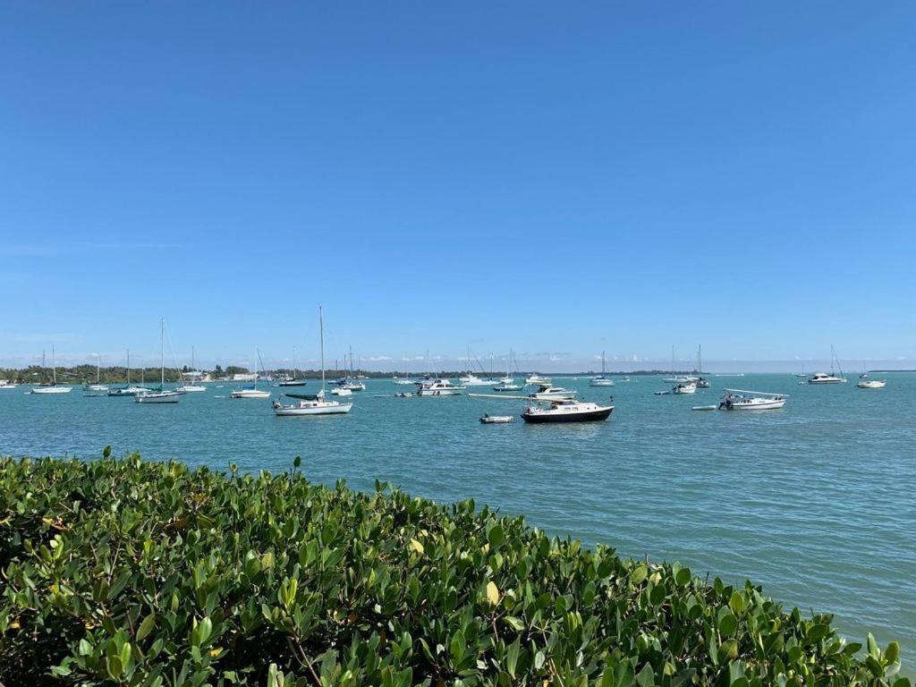 Ideal beach hideaway pool condo located between the island marina and beach view 4