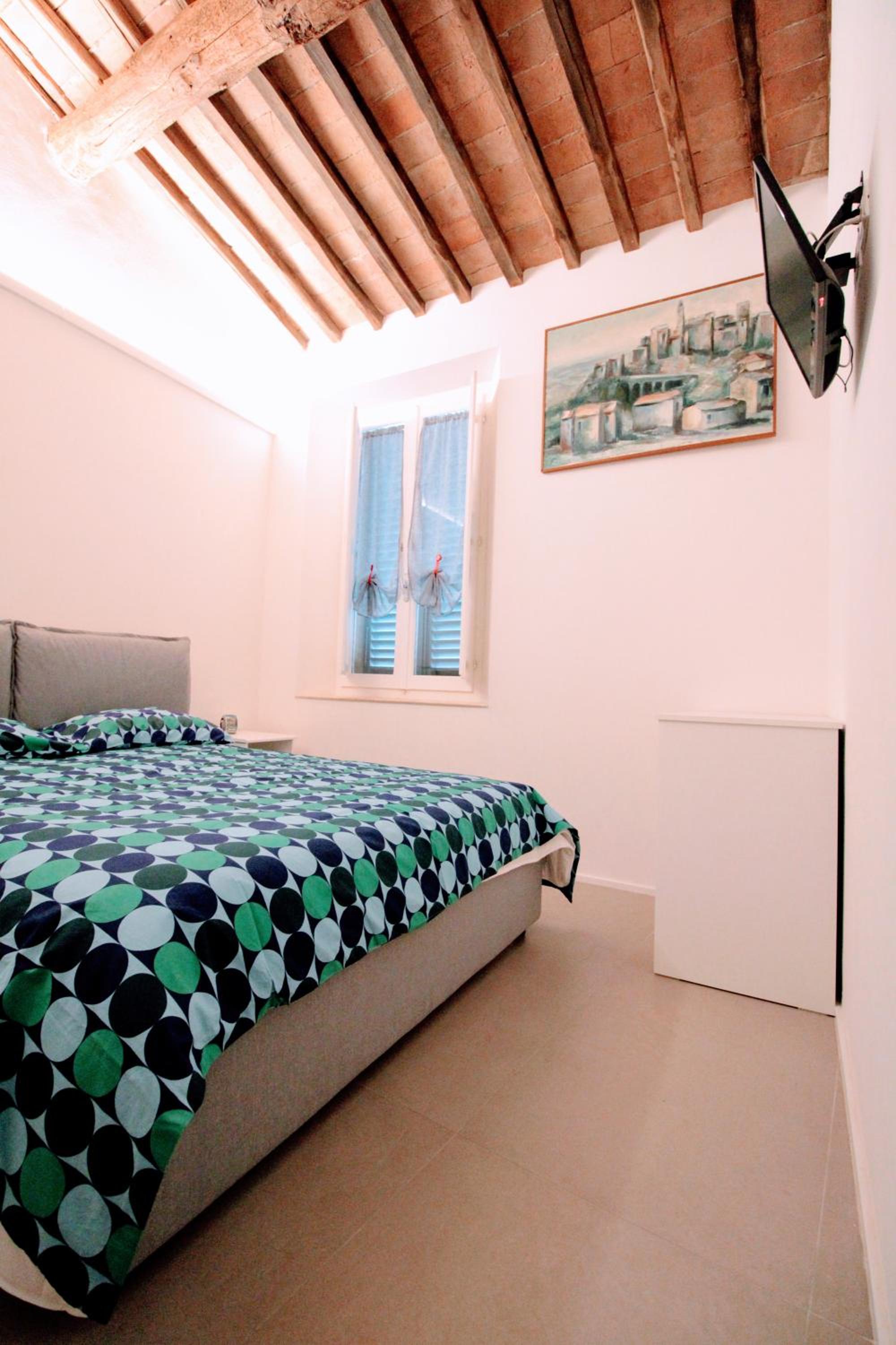 The Galluzza house en Siena — hotel room