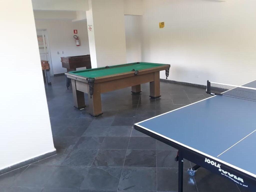 Apartamento com piscina 1 quarto de até 6 pessoas - Guarujá com Maquina Lavar Roupa