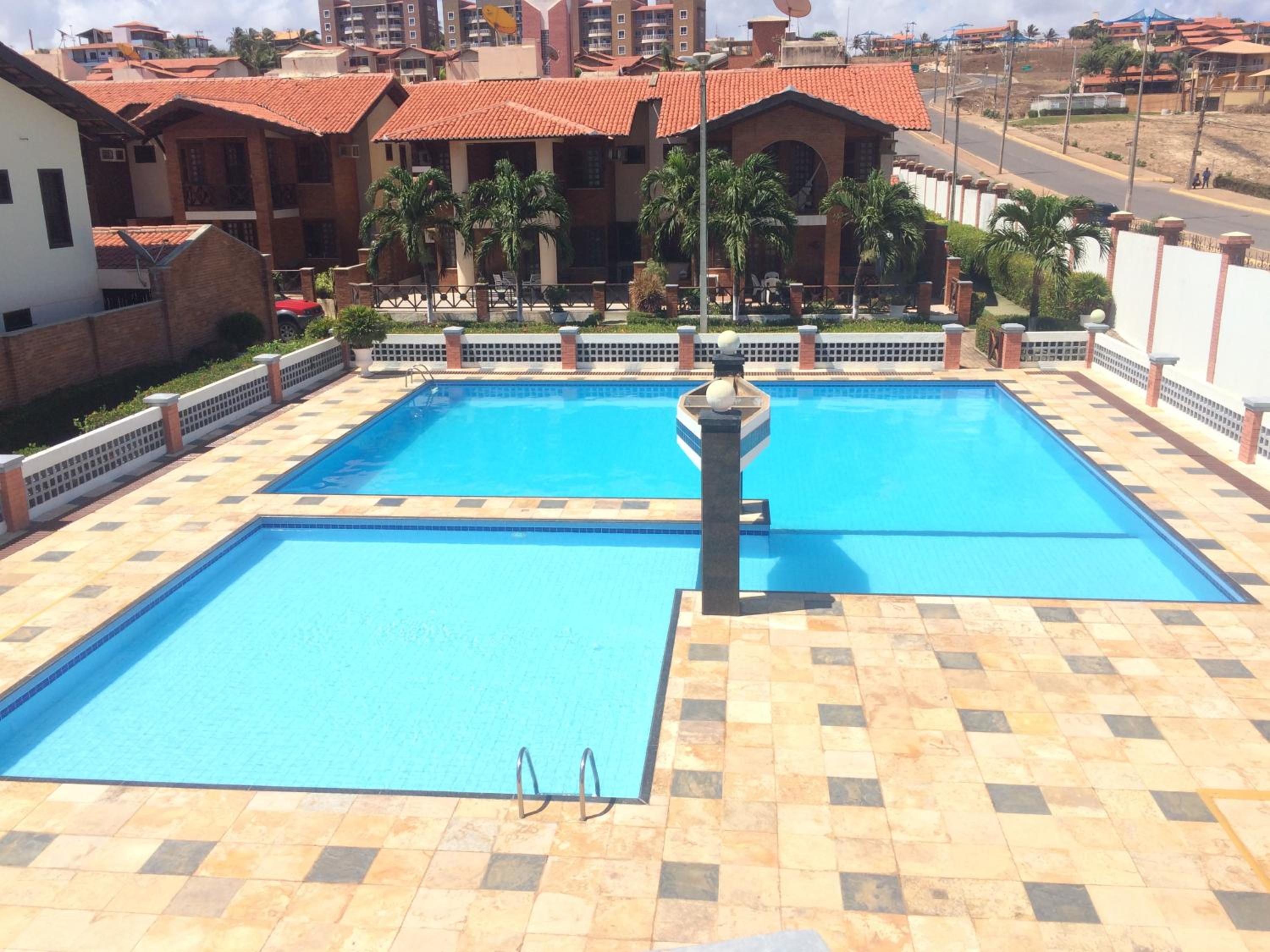 Linda casa Porto das Dunas: 4 suítes, churrasqueira e piscina