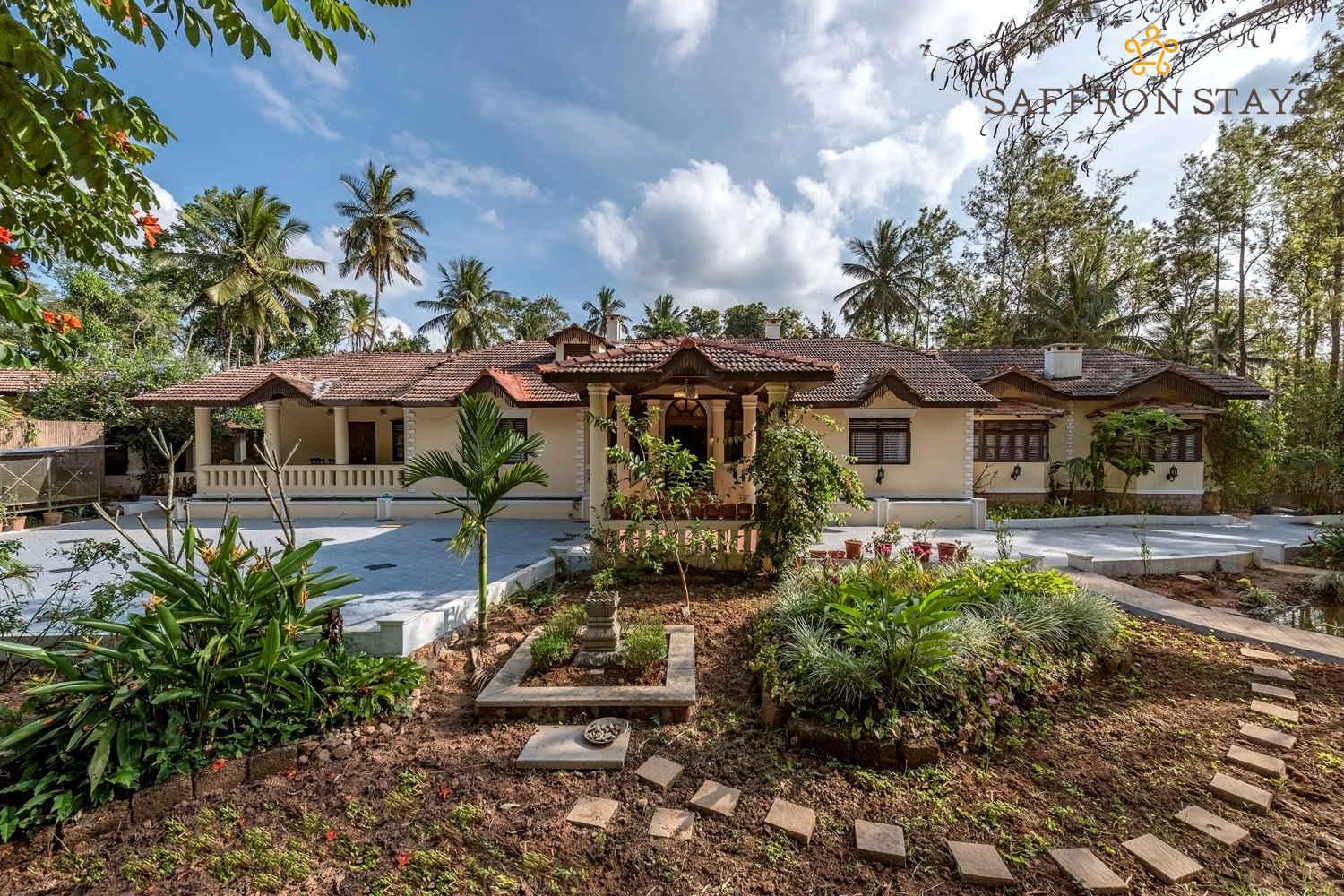 SaffronStays Calamondinn Bungalow - 5BR Colonial Heritage Home within Coffee Plantation in Coorg view 2