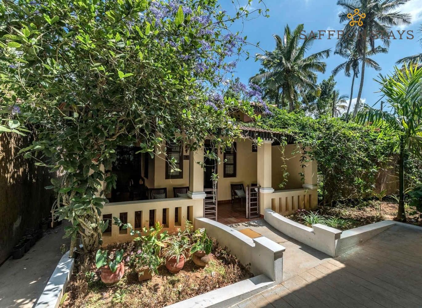 SaffronStays Calamondinn Bungalow - 5BR Colonial Heritage Home within Coffee Plantation in Coorg