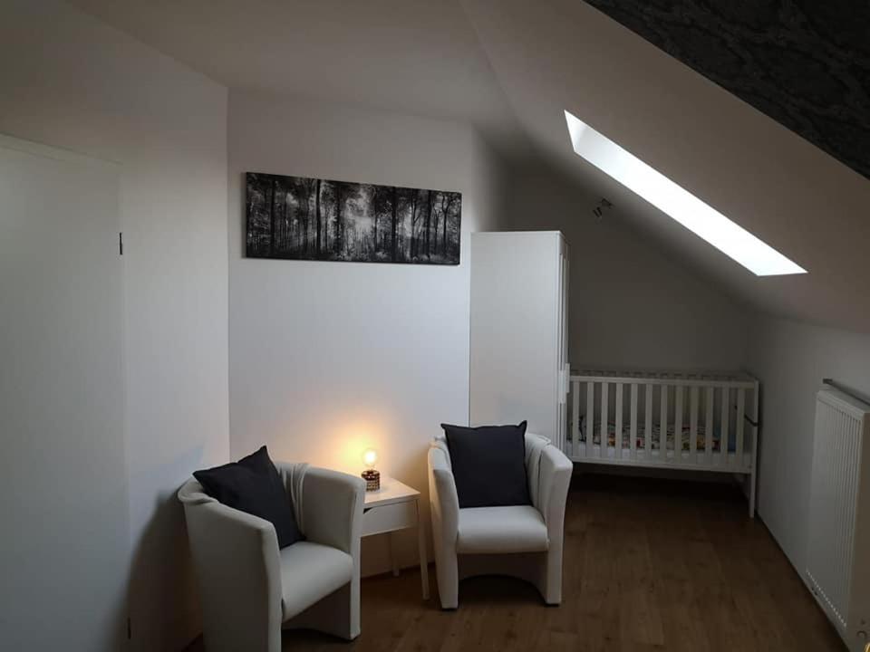 Haus am Hang; Ferienwohnung Fernblick view 2