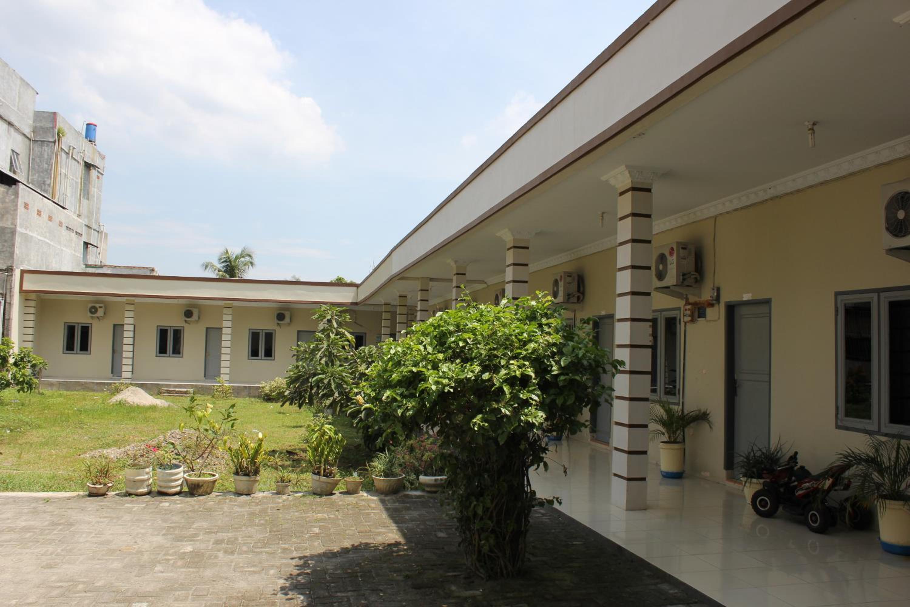 Penginapan Transit Tomato view 5