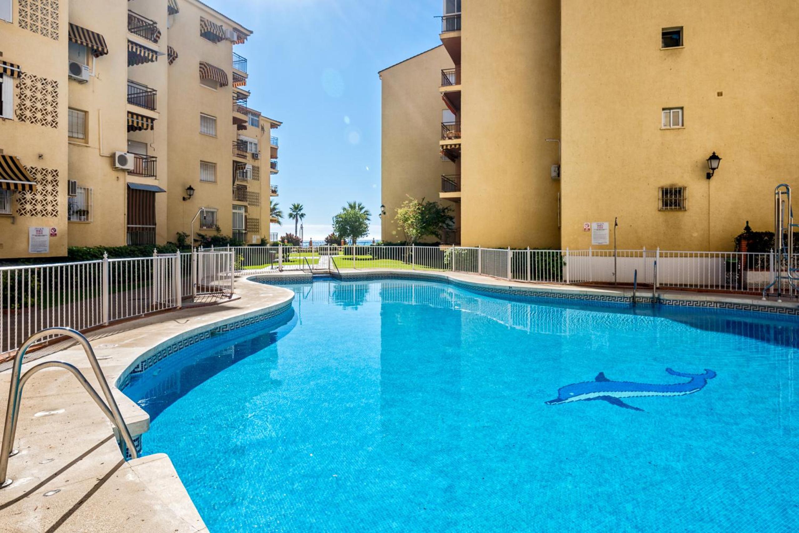 WintowinRentals 1st Linea de playa vista al mar y piscina view 4