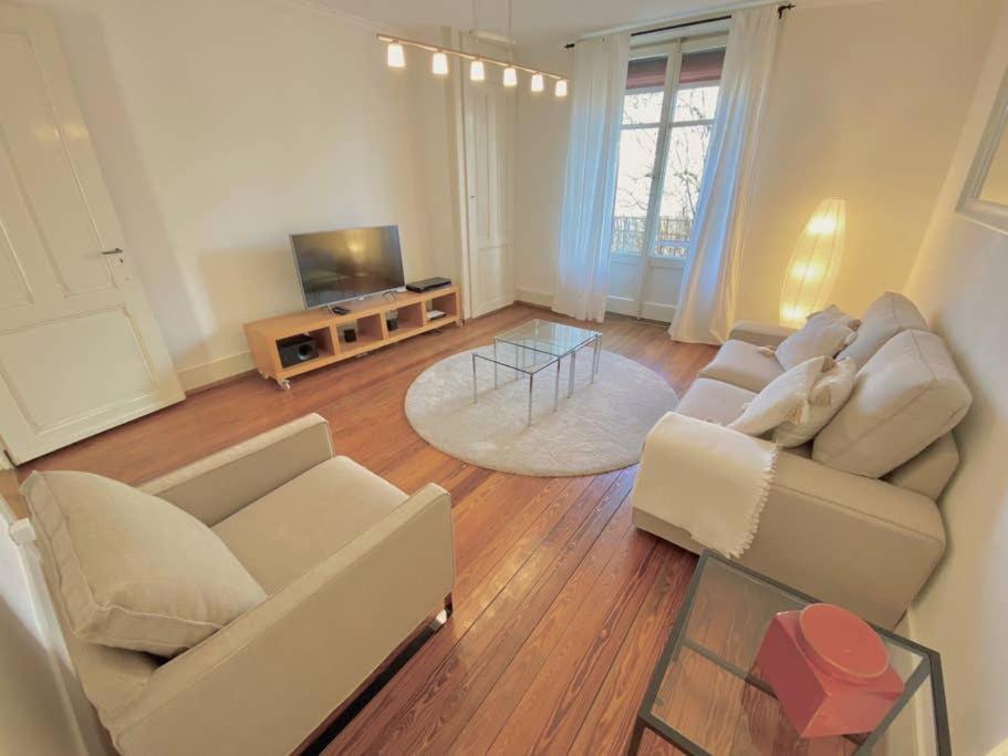 Your bright charming cocoon between lake and city view 2