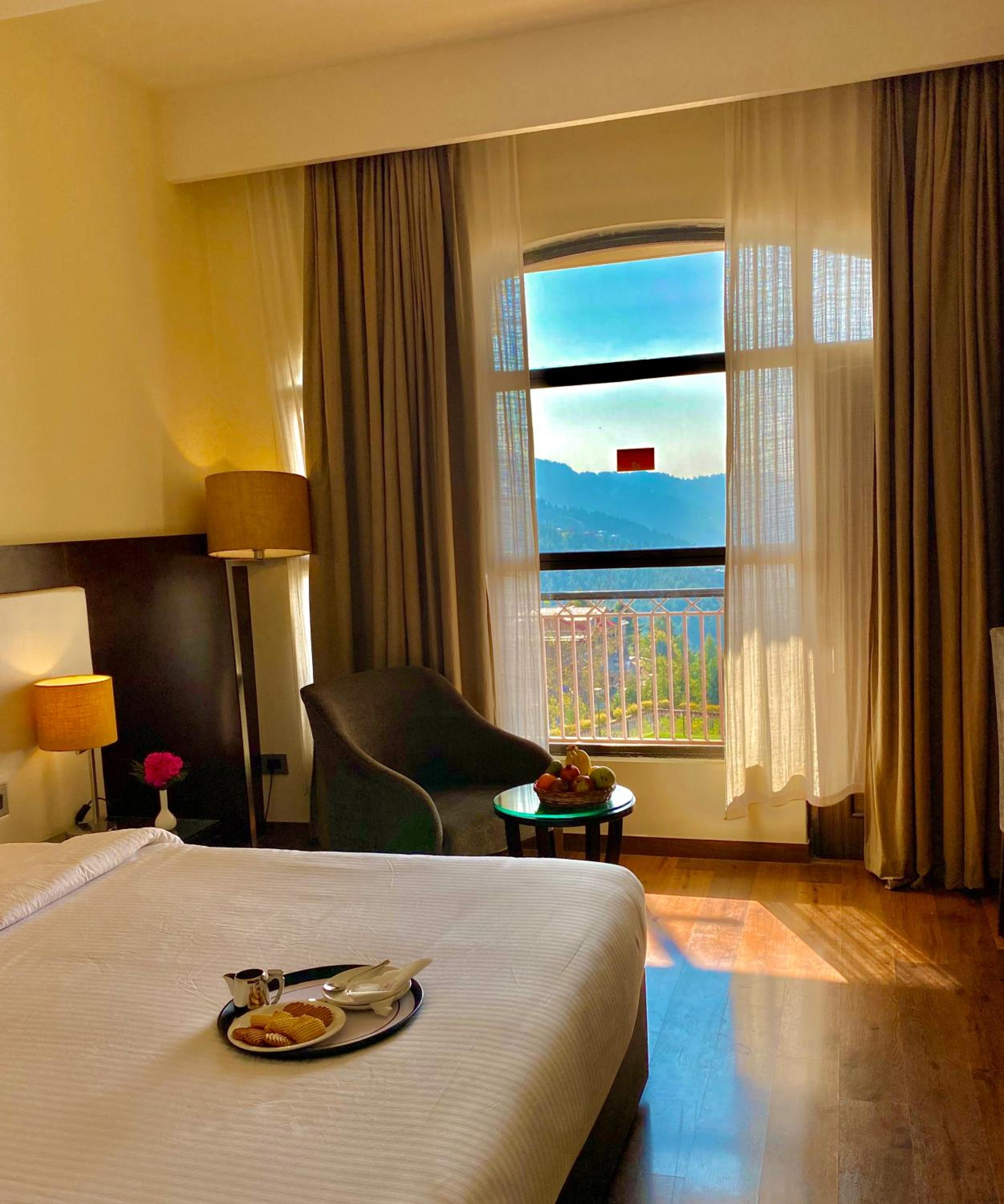 Marigold Sarovar Portico Shimla with Heated pool and AC Rooms-A Resort cottage and SPA Marigold Sarovar Portico Shimla with Heated pool and AC Rooms-A Resort cottage and SPA