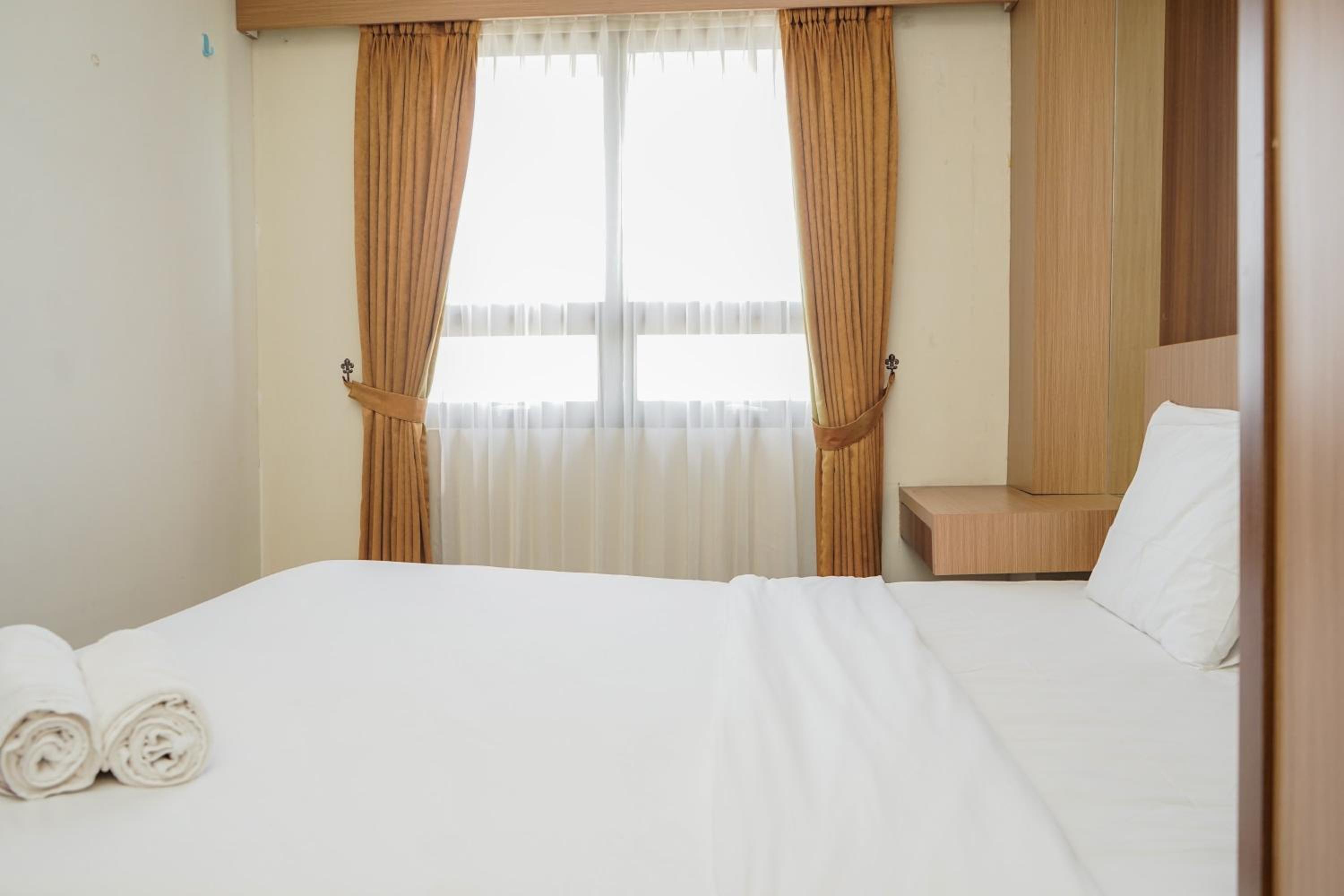 Fully Furnished with Comfortable Design 2BR Apartment Atria Residences By Travelio