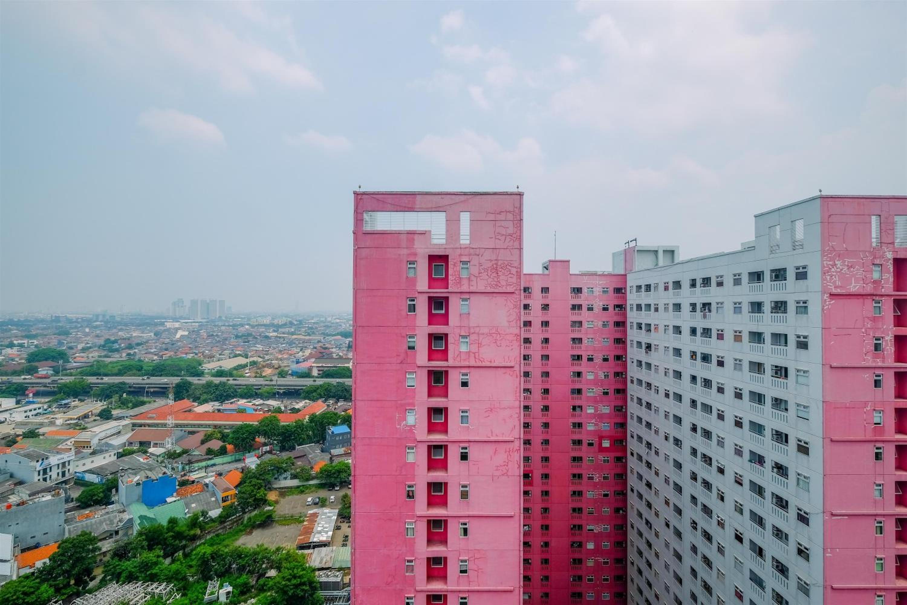 Furnished Green Pramuka 1BR Apartment with Modern Style and City View By Travelio