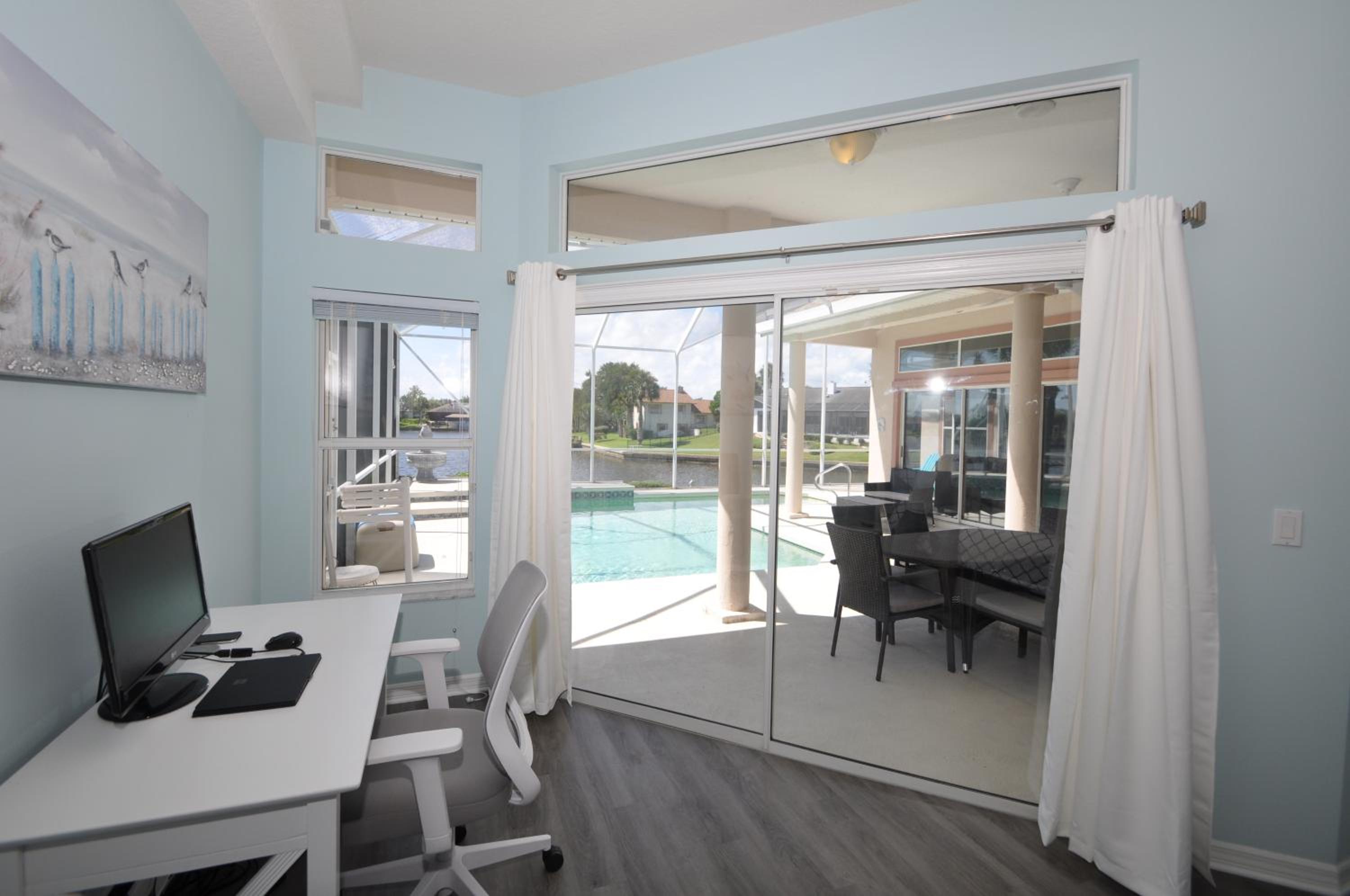 Sunset Bay Beautiful Pool Home - Bring Your Boat or Jet Ski - Canal with Dock- Sleeps 10 - 4 BD view 5