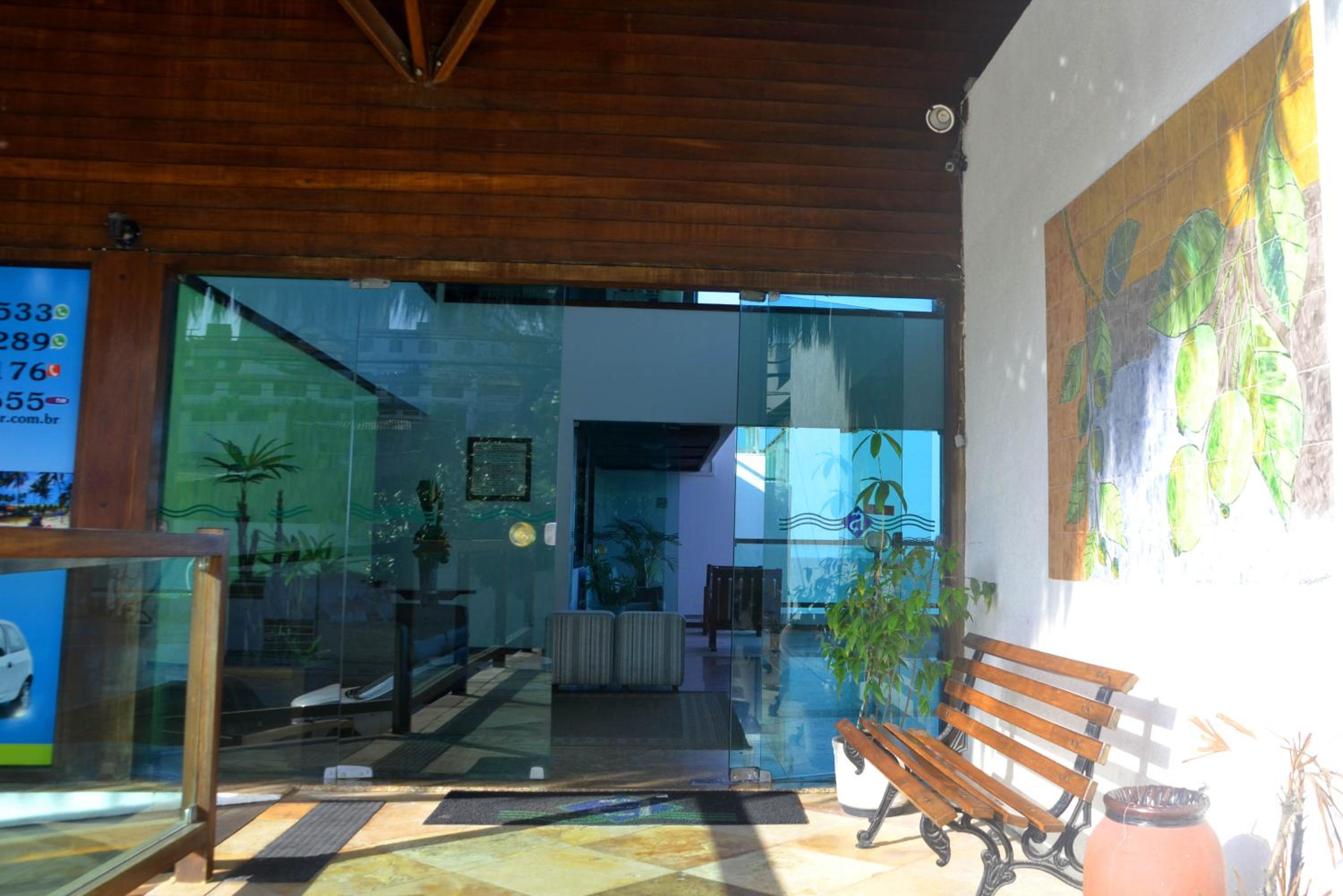 Na praia - Araça 206 Luxo - Lateral vista jardim