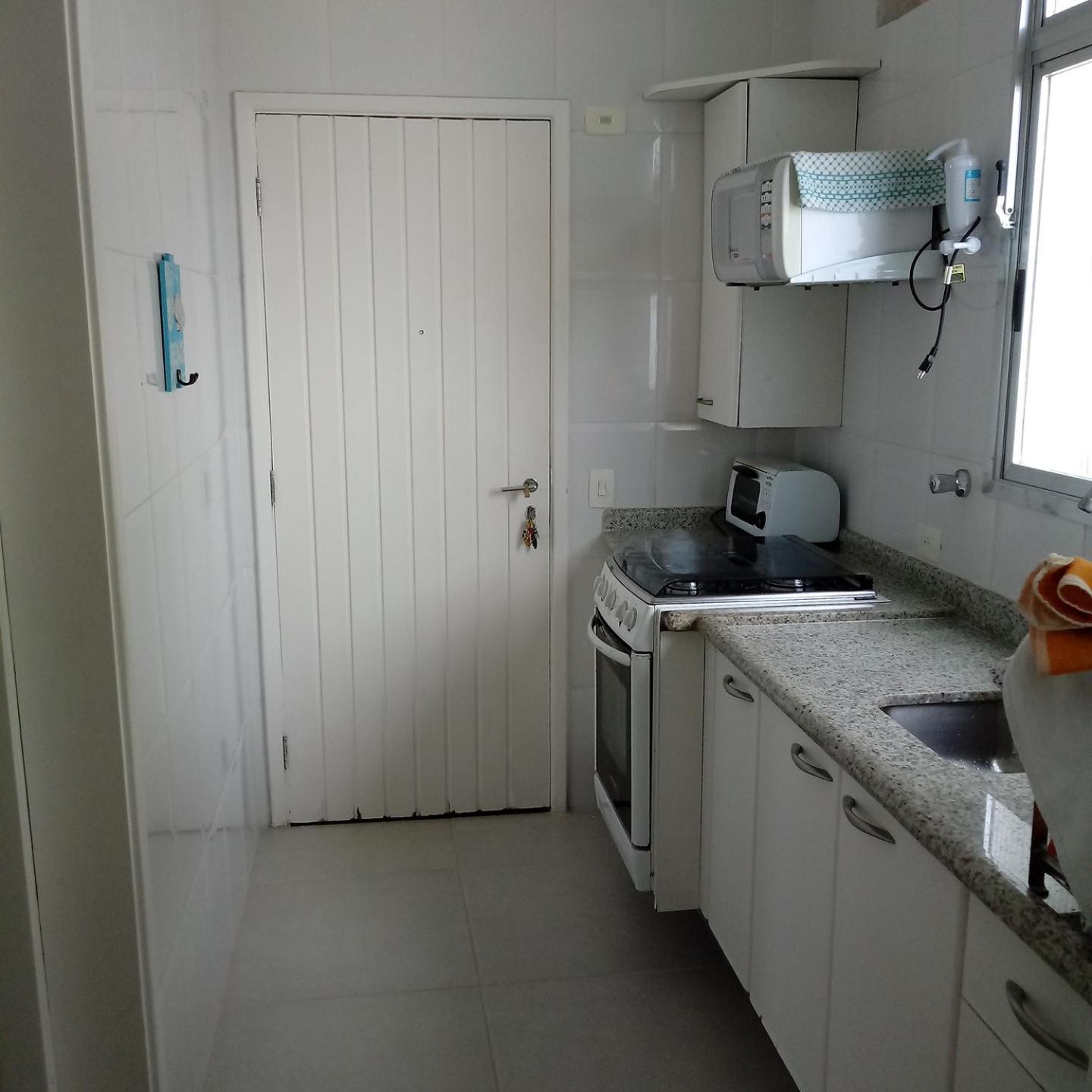 Apto frente praia Asturia Guaruja