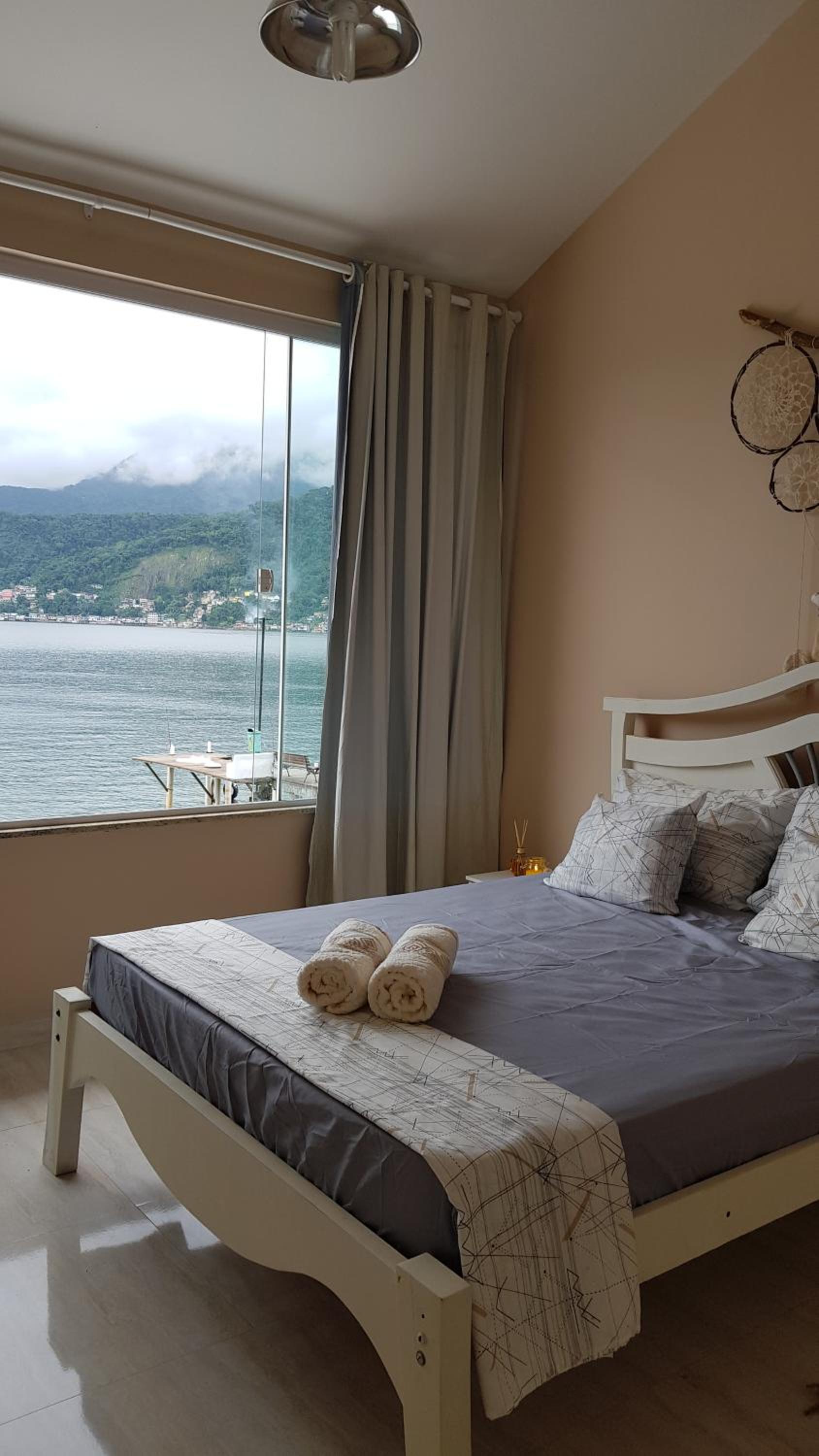 Casa na Ilha Jardim pé na areia