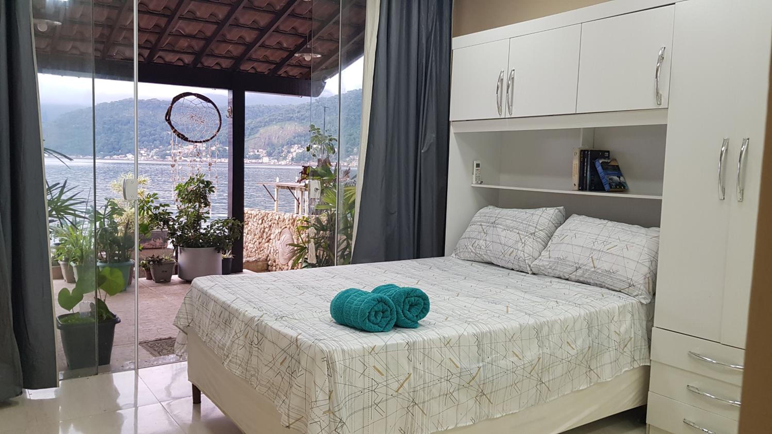 Casa na Ilha Jardim pé na areia