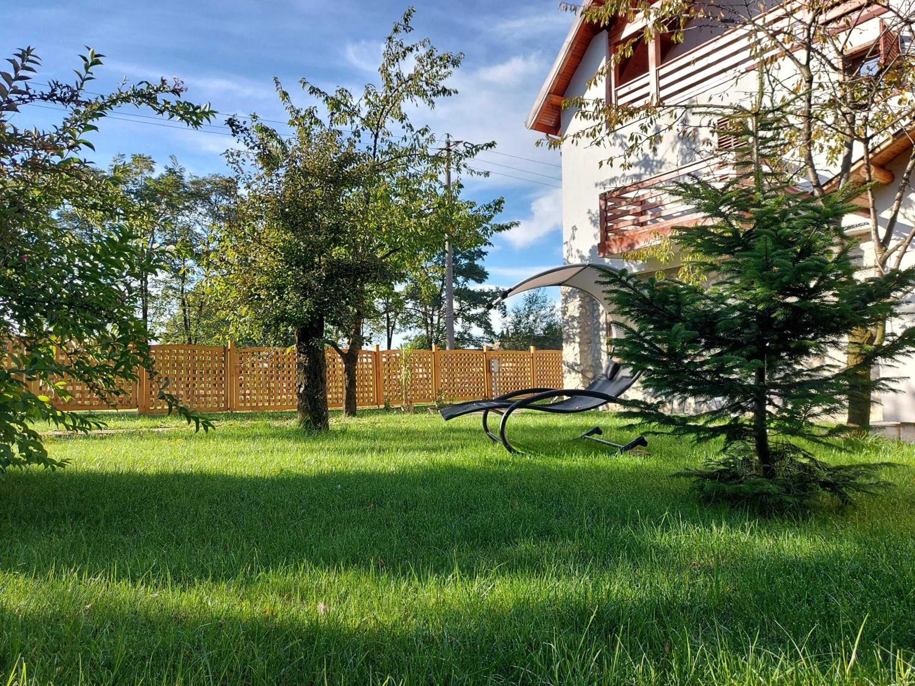 Modern mountain village chalet in Carpathians view 3