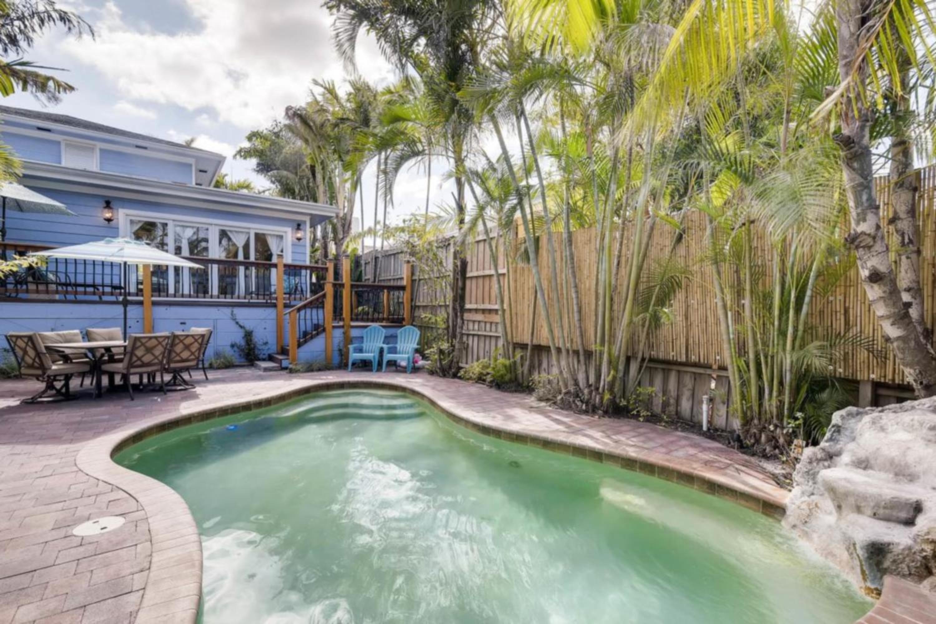 The Periwinkle House - Bask Poolside at this Sunlit West Palm Retreat view 3