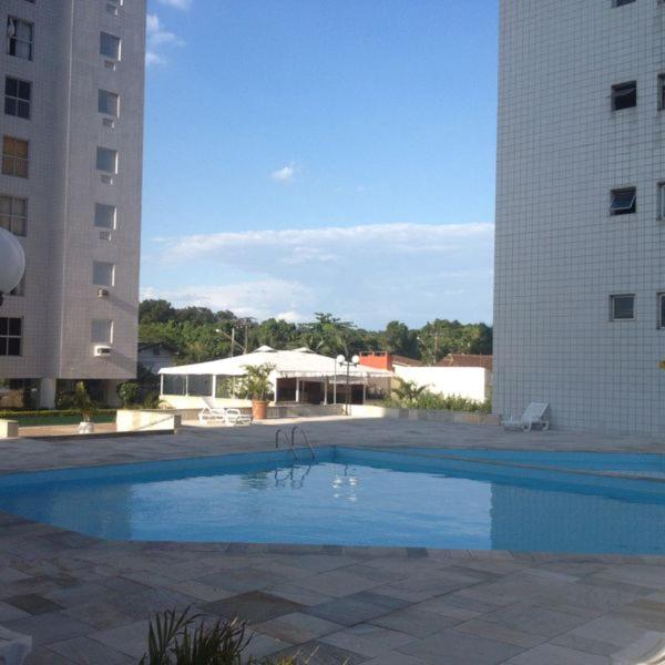 Apartamento com piscina 1 quarto de até 6 pessoas - Guarujá com Maquina Lavar Roupa