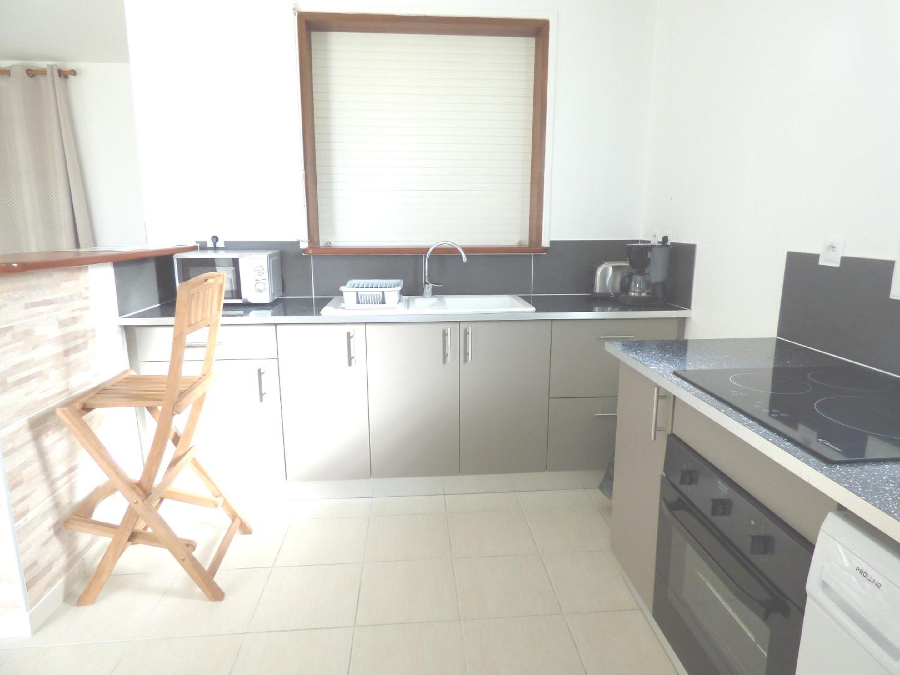 Appartement cosy Les Trois-Îlets 85 m² jardin verdoyant view 2