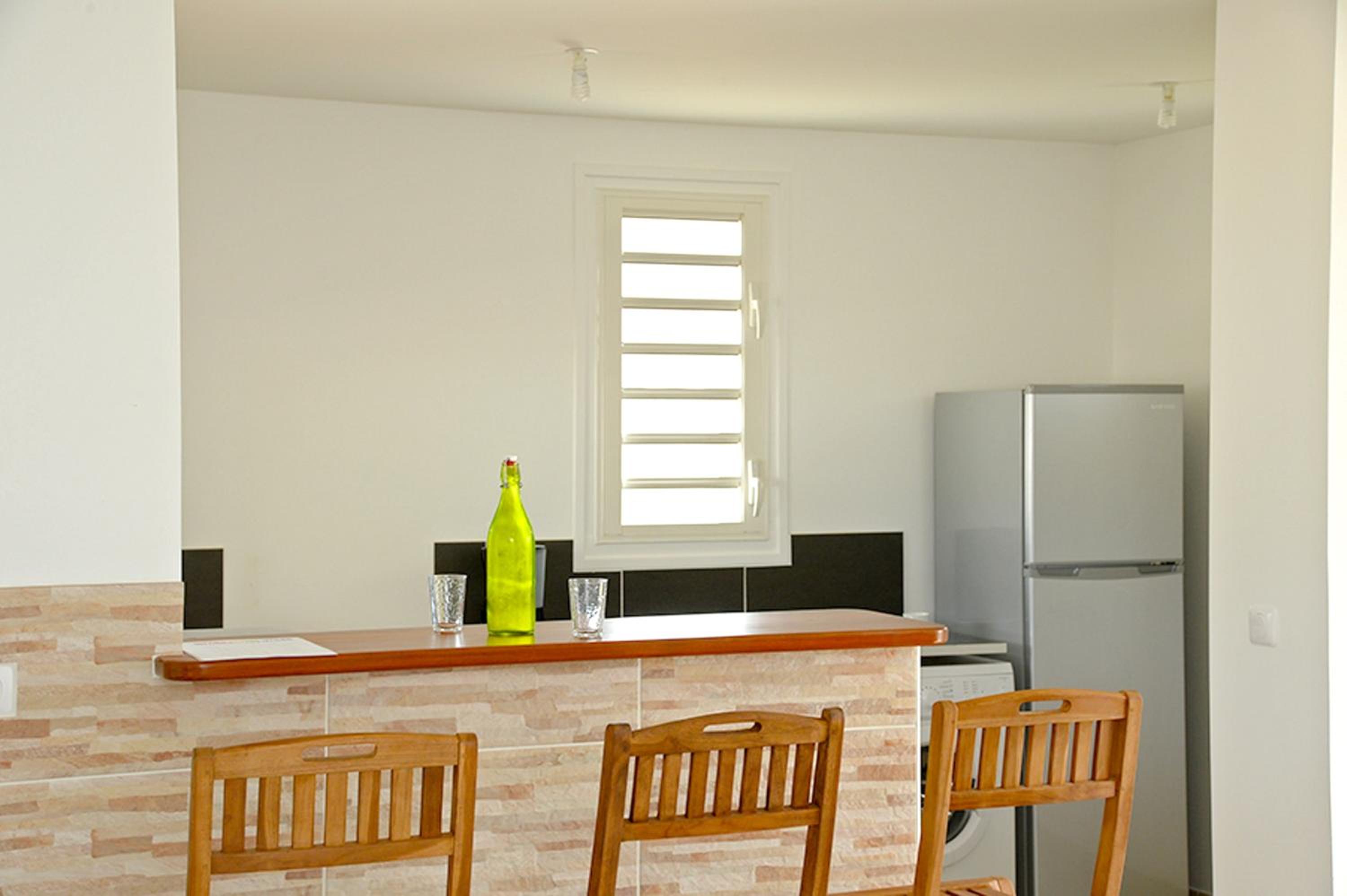 Appartement cosy Les Trois-Îlets 85 m² jardin verdoyant view 4