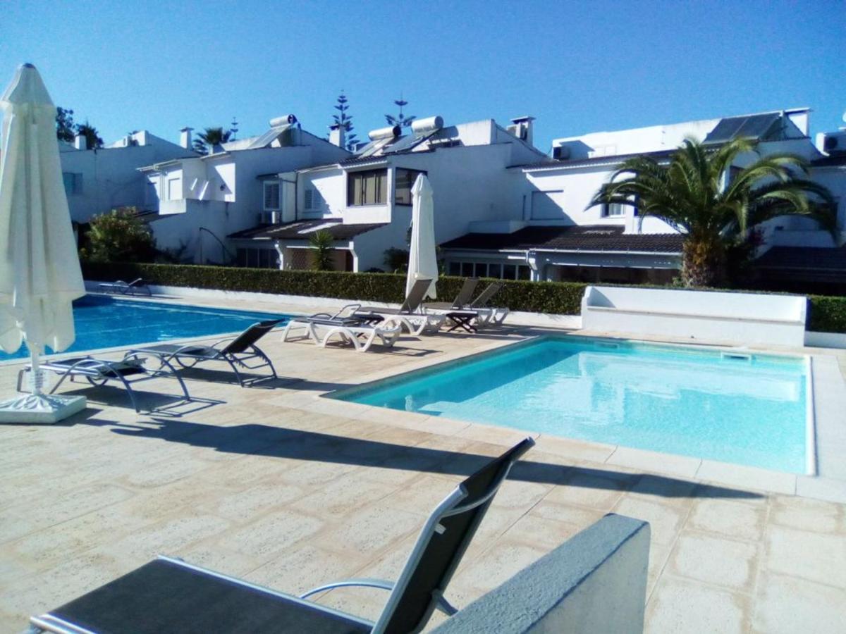 4 bedrooms house with shared pool furnished garden and wifi at Corroios 4 km away from the beach