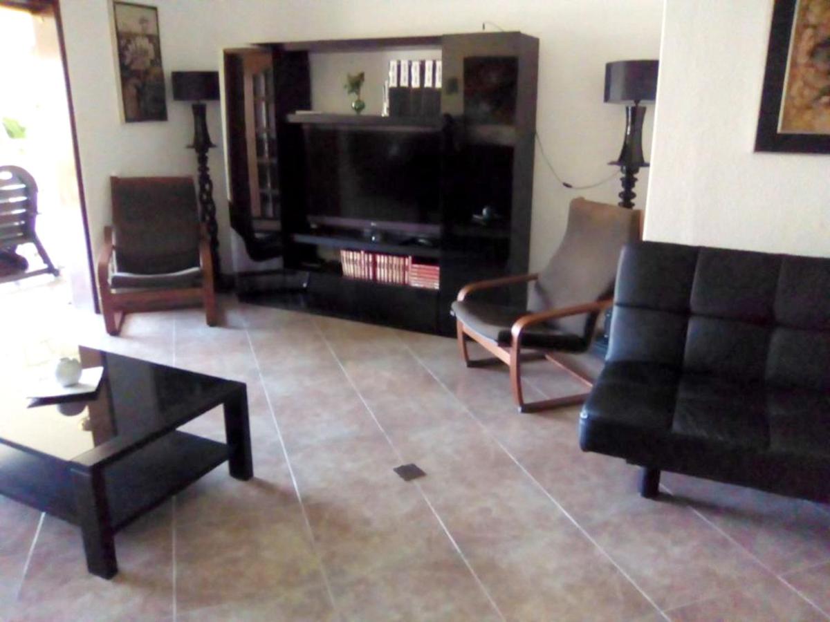 4 bedrooms house with shared pool furnished garden and wifi at Corroios 4 km away from the beach
