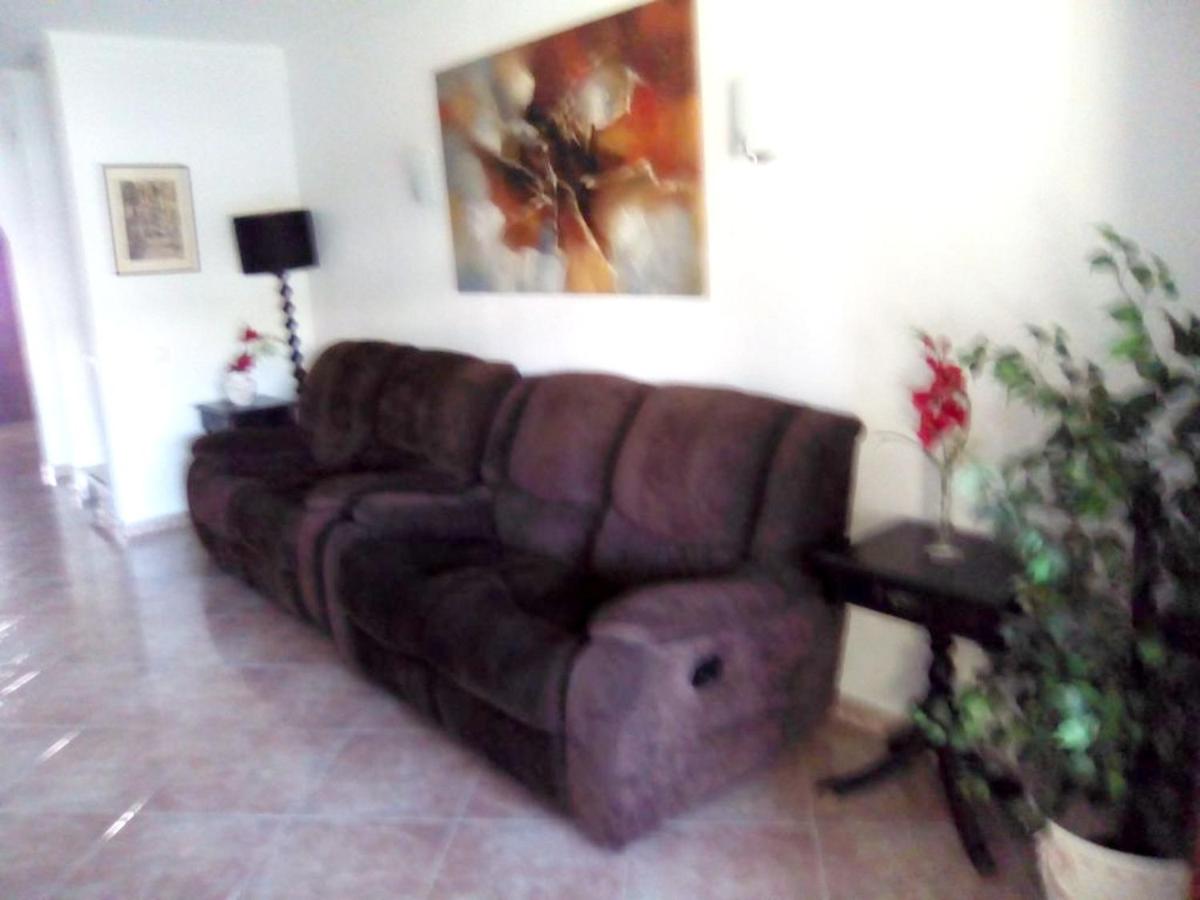 4 bedrooms house with shared pool furnished garden and wifi at Corroios 4 km away from the beach
