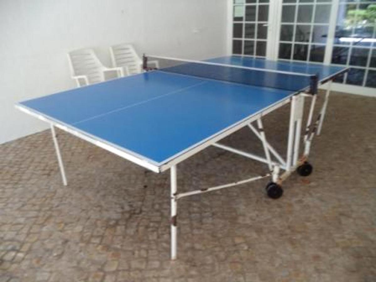 4 bedrooms house with shared pool furnished garden and wifi at Corroios 4 km away from the beach