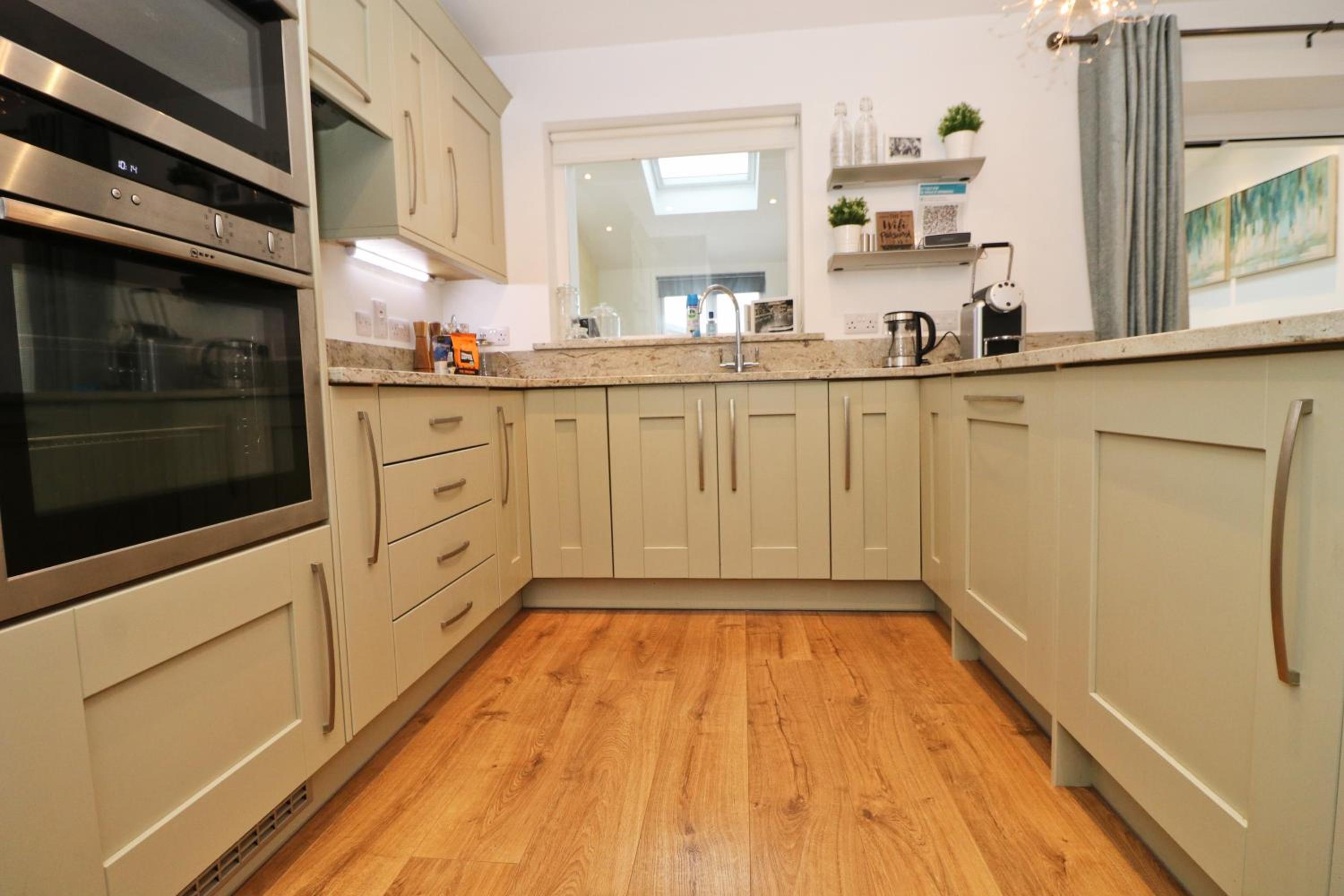 NEAR BEACHES, contemporary home in village centre