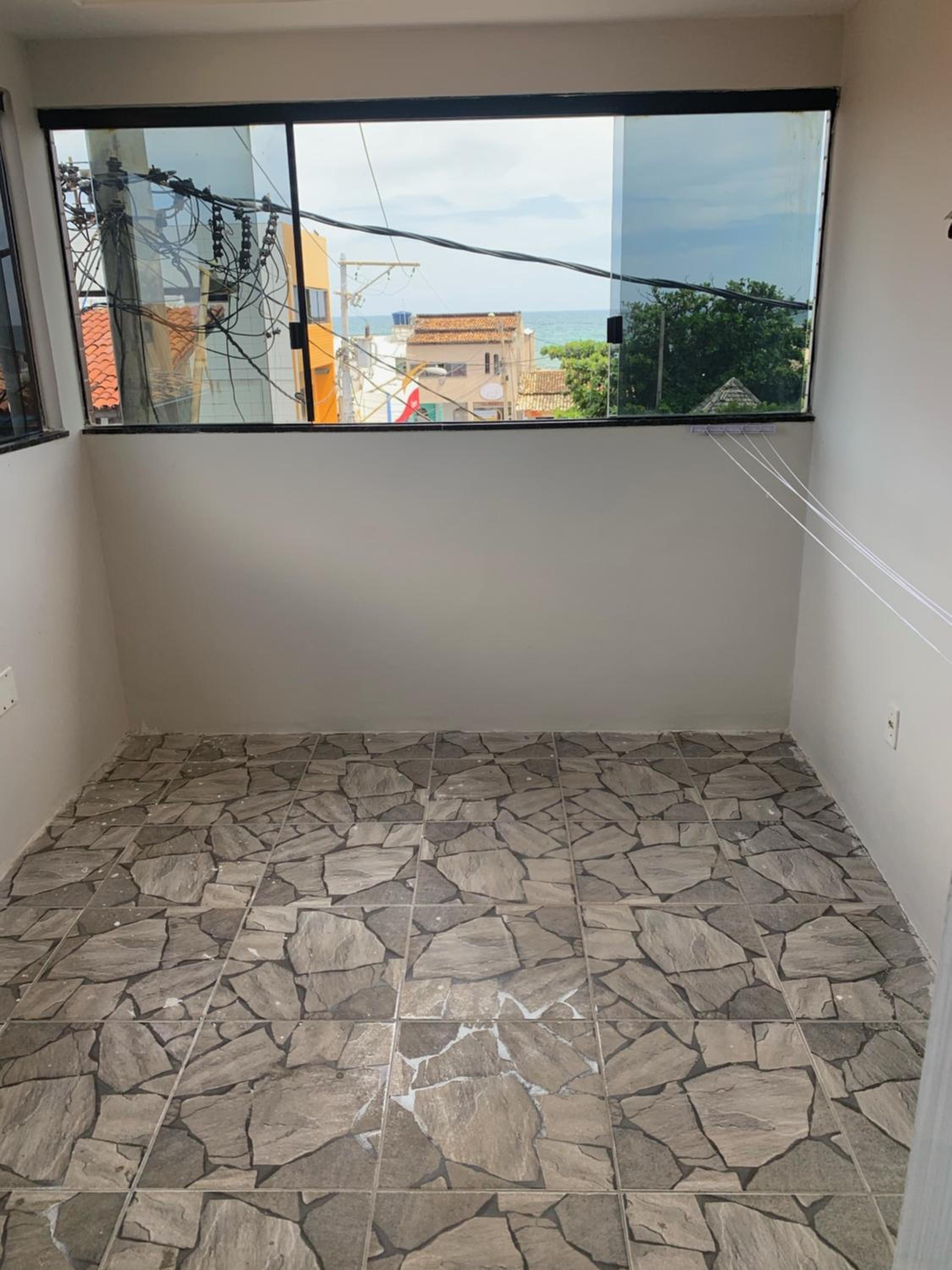 CASA NA PRAÇA DE AREMBEPE