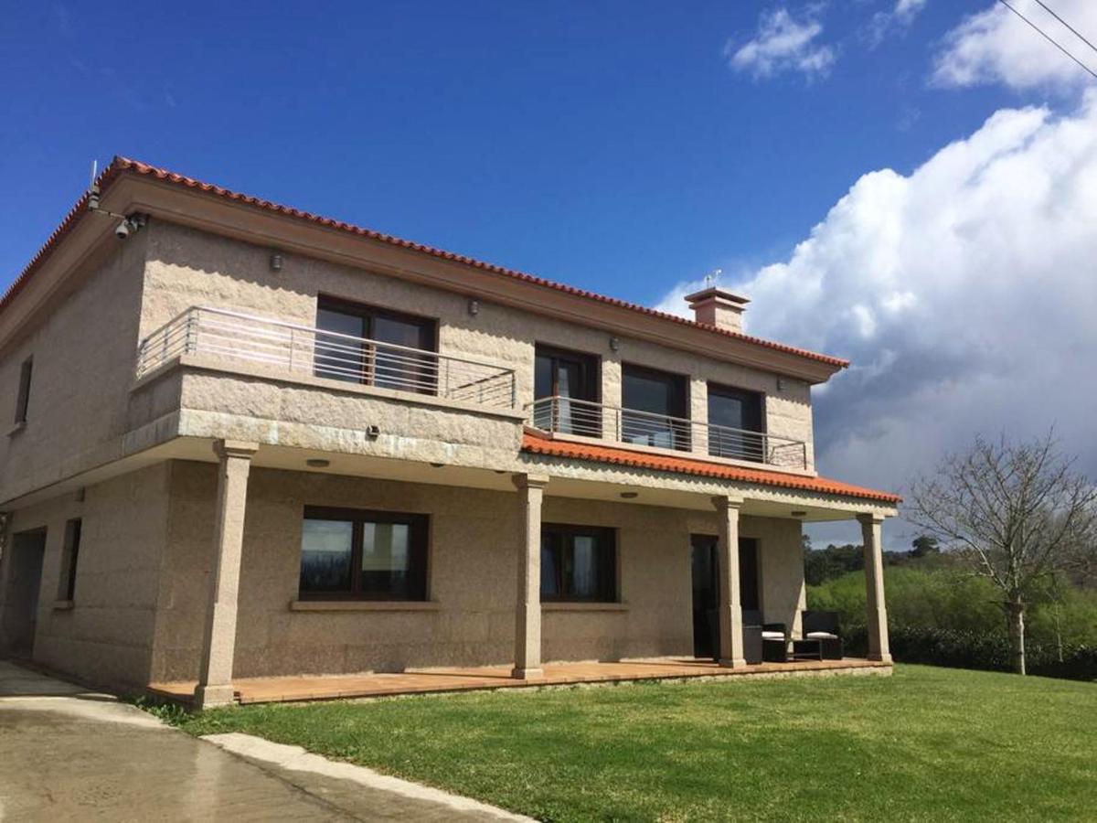 4 bedrooms house with shared pool jacuzzi and enclosed garden at Sanjenjo view 5