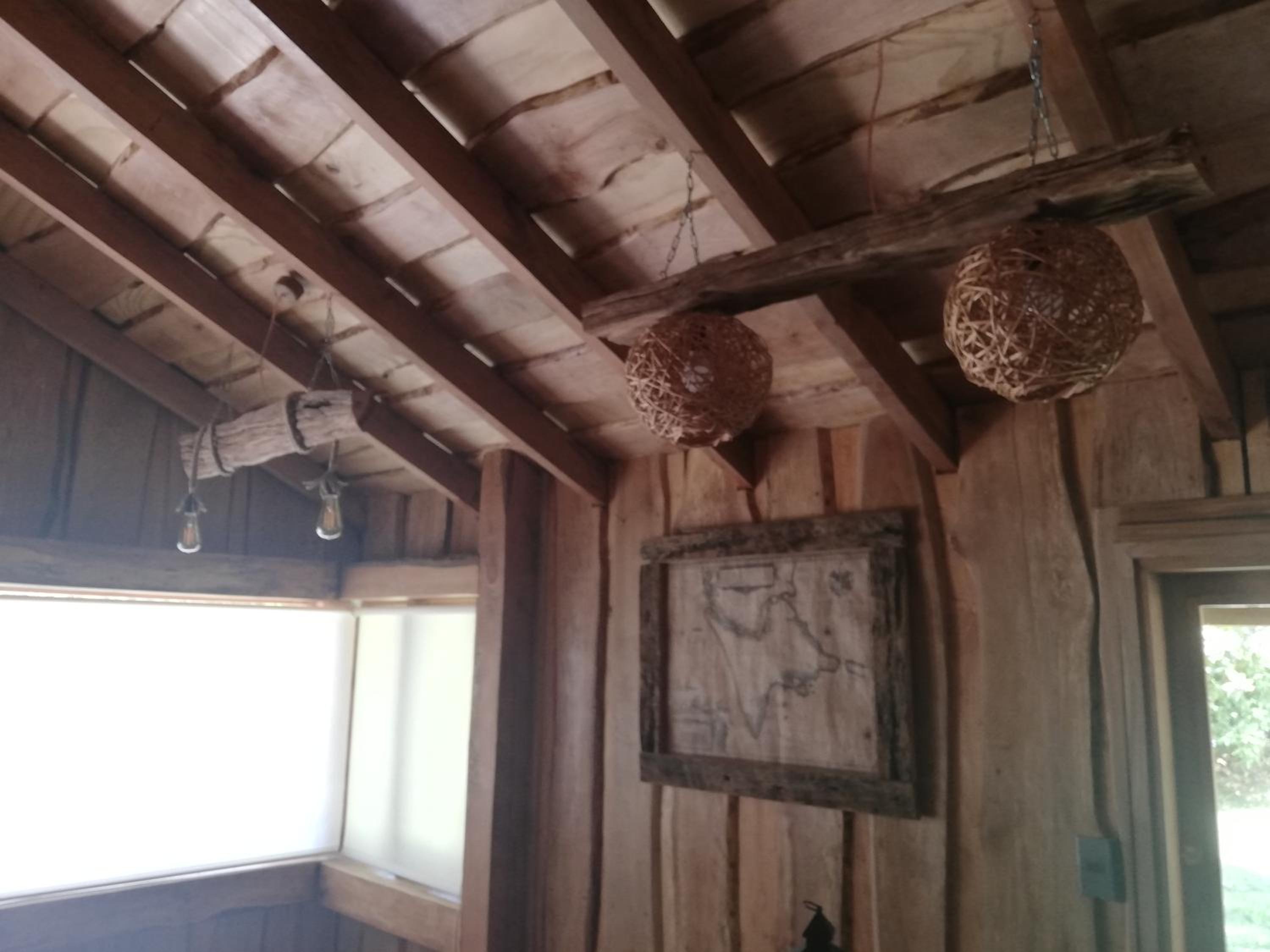 Wonderful rustic cabin 2, with native logs, on the banks of the Trancura River