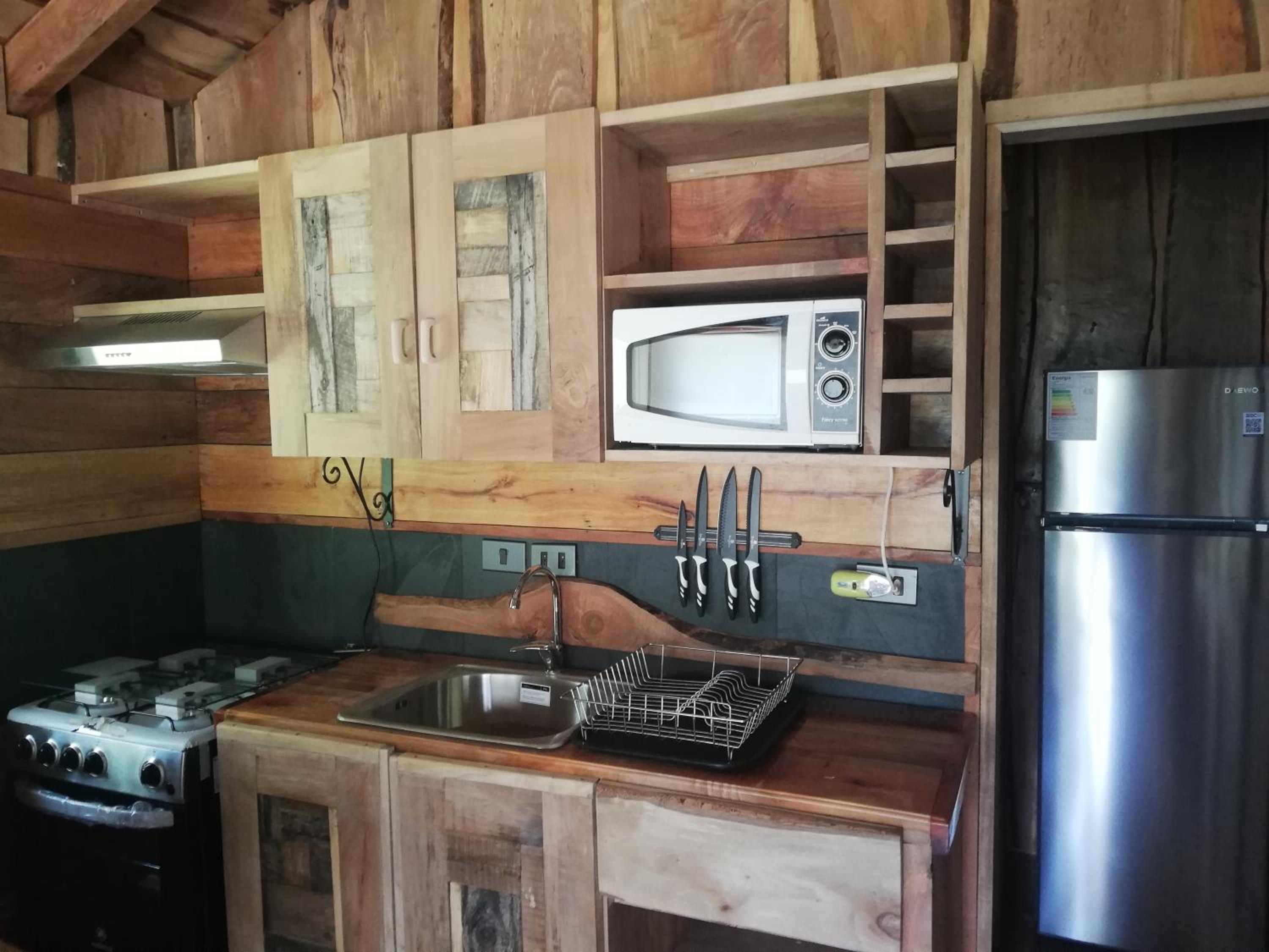 Wonderful rustic cabin 2, with native logs, on the banks of the Trancura River