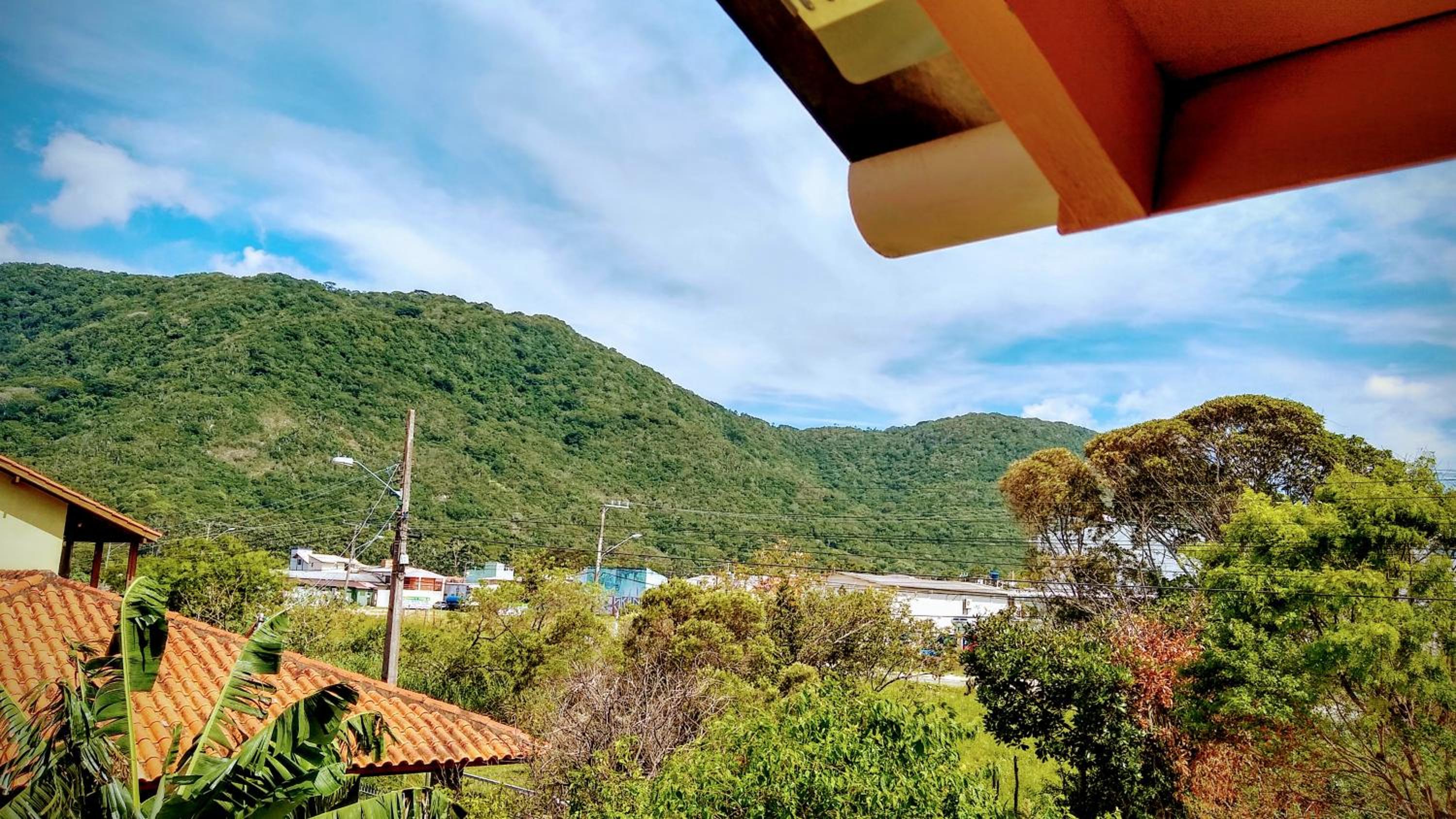 Apto jeito de casa entre mar e montanha AR
