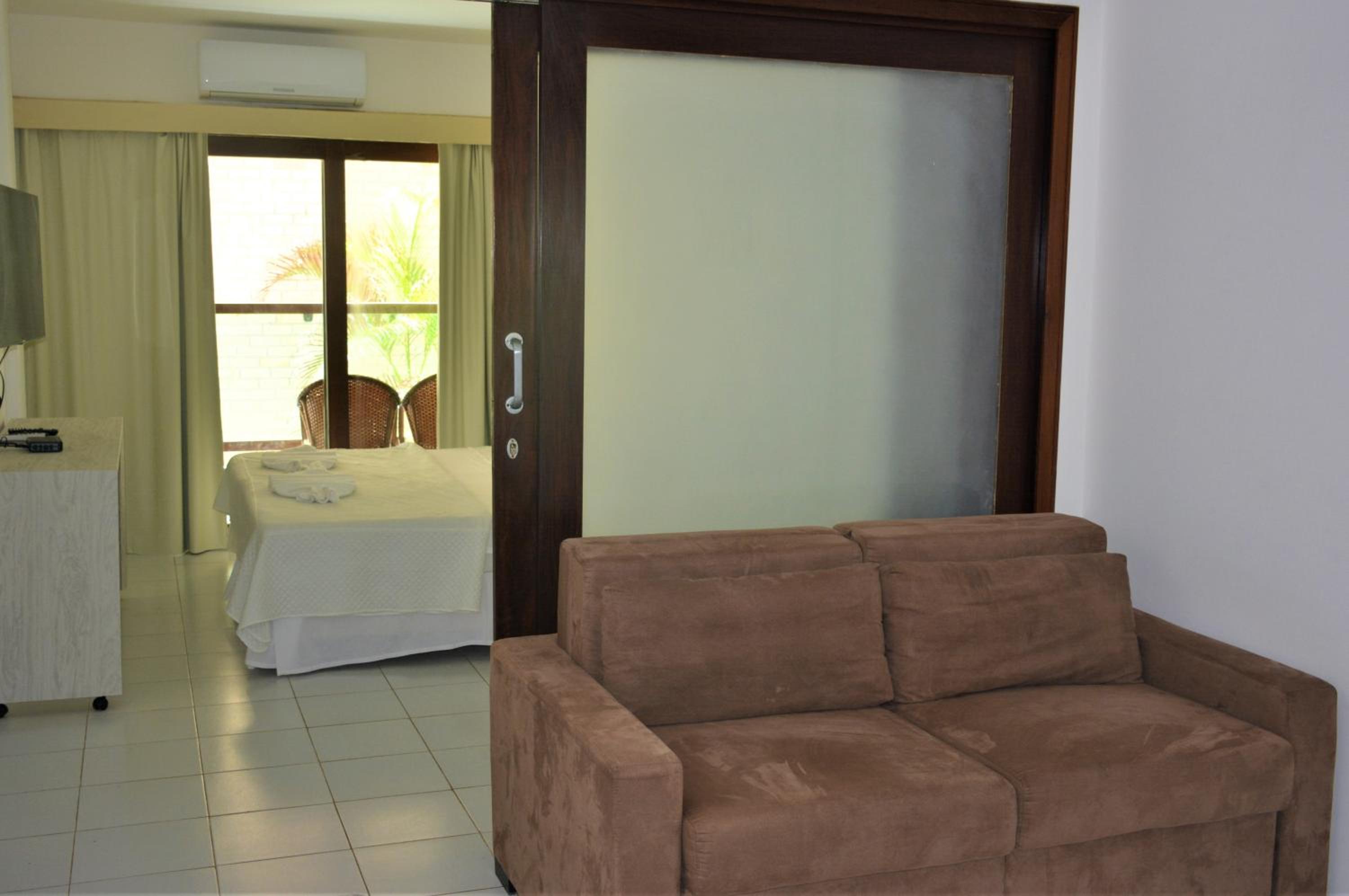 Na praia - Araça 206 Luxo - Lateral vista jardim