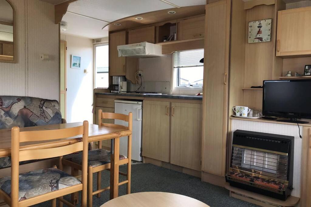 Knusse caravan camping Duinoord 300m van strand