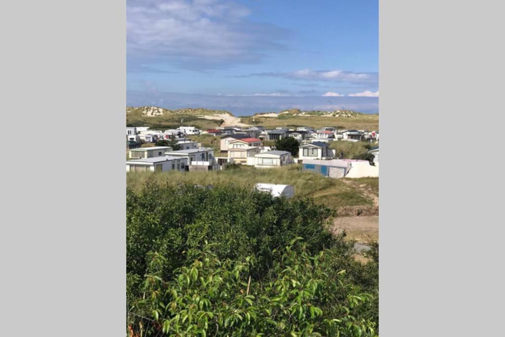 Knusse caravan camping Duinoord 300m van strand en Nes