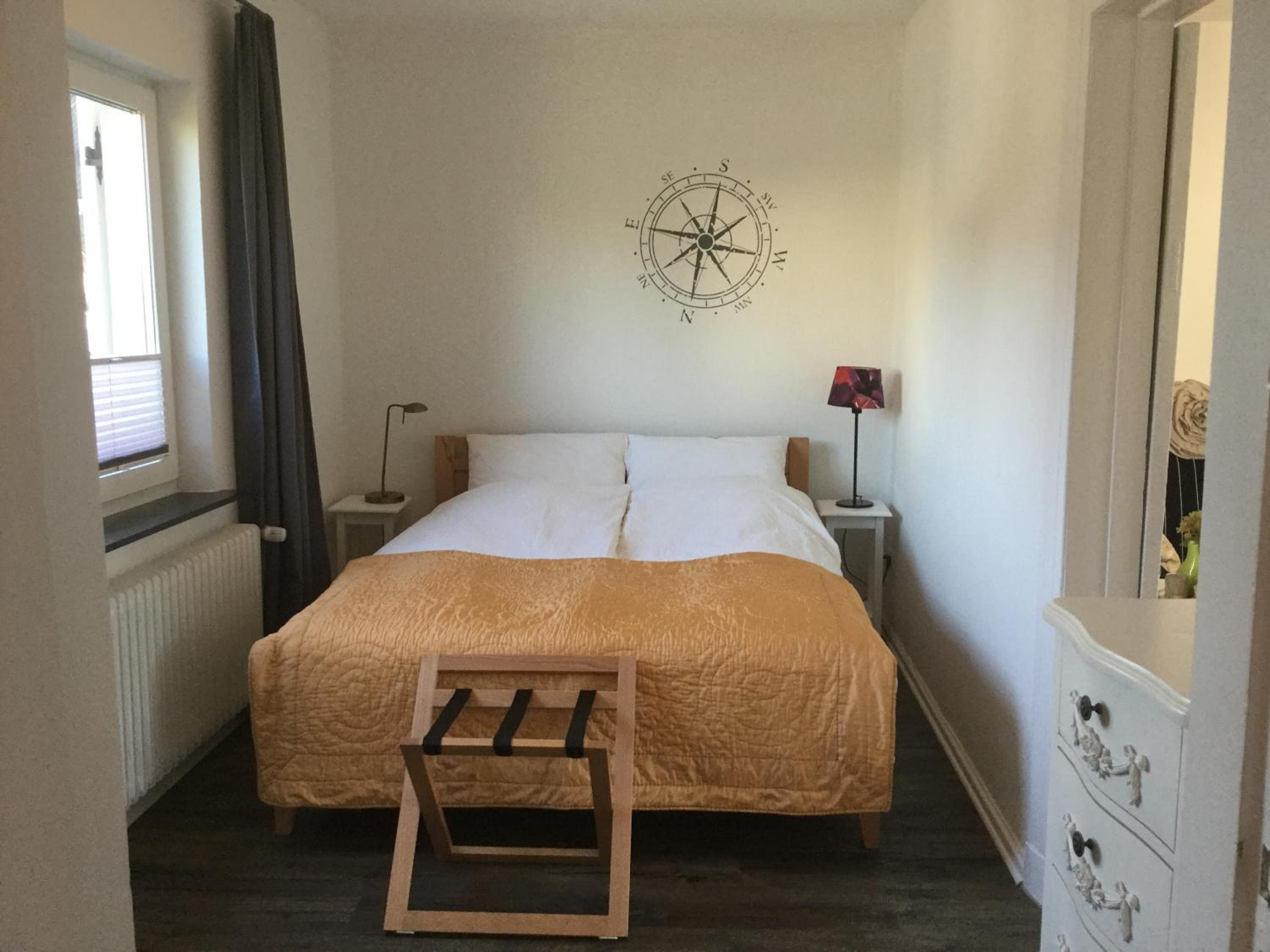Ferienhaus Us lütt Hus und das Zimmer Linde im Haupthaus
