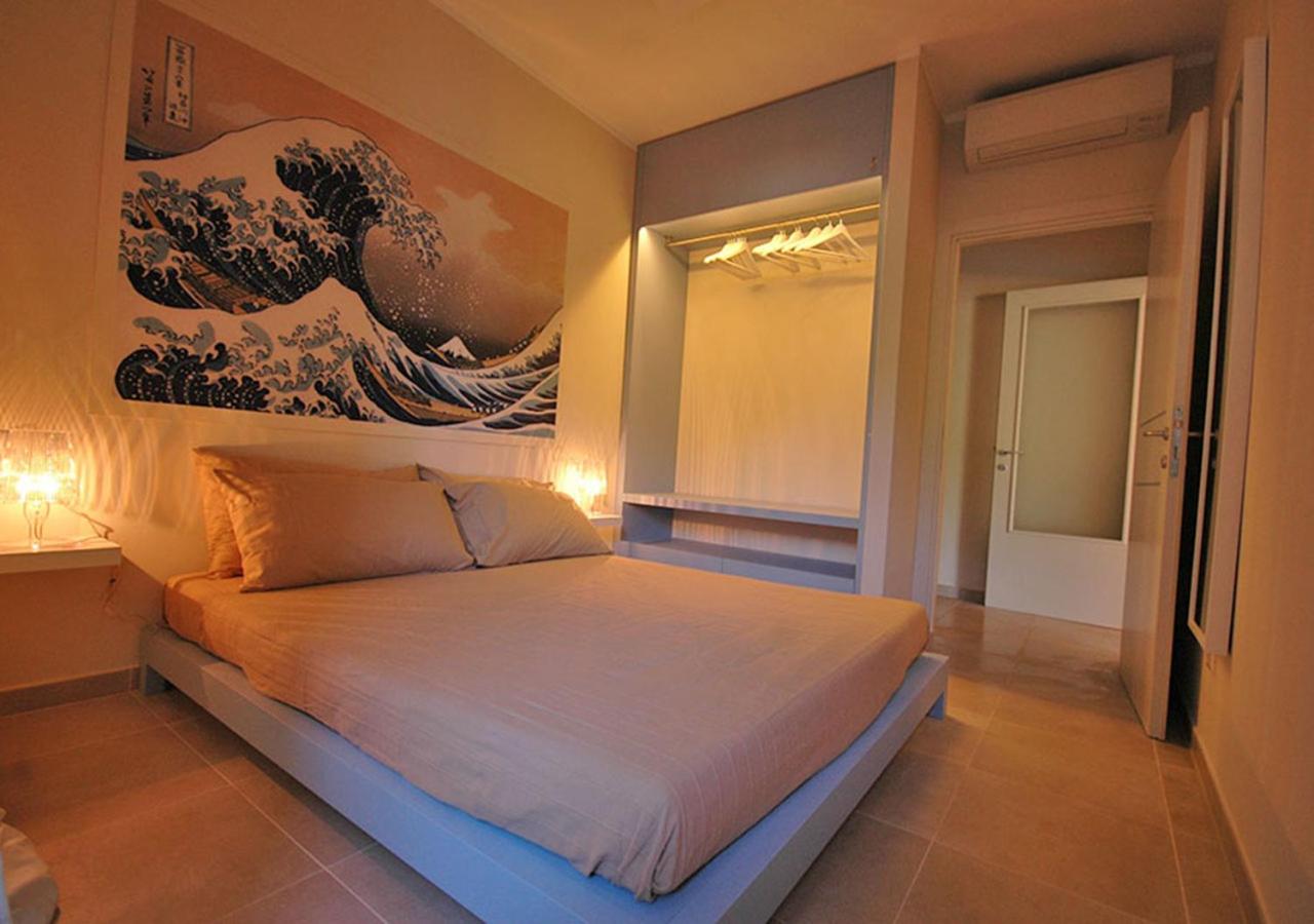 LE MAREE ALTA MAREA en Procchio — hotel room