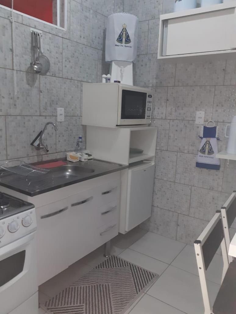 Flat familiar com ar,wi fi,cozinha e garagem