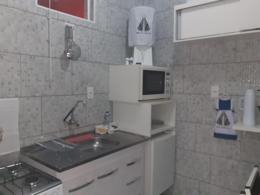 Flat familiar com ar,wi fi,cozinha e garagem