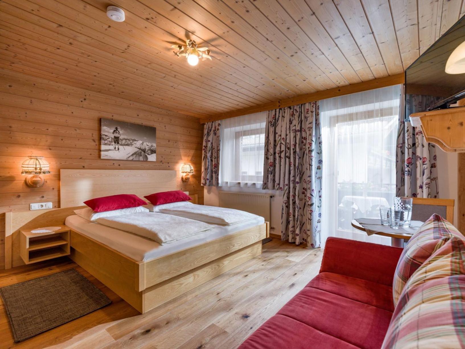 Pension Hinterholzer Apartments und Zimmer