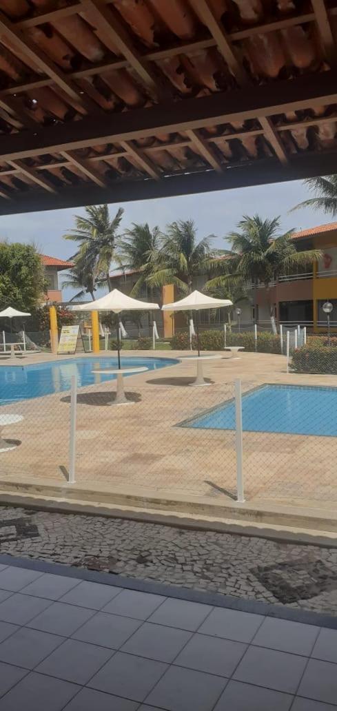 Ap por temporada com 2 quartos e uma suíte , excelente área de lazer, Praia do Futuro, condomínio Cartier-Fortaleza