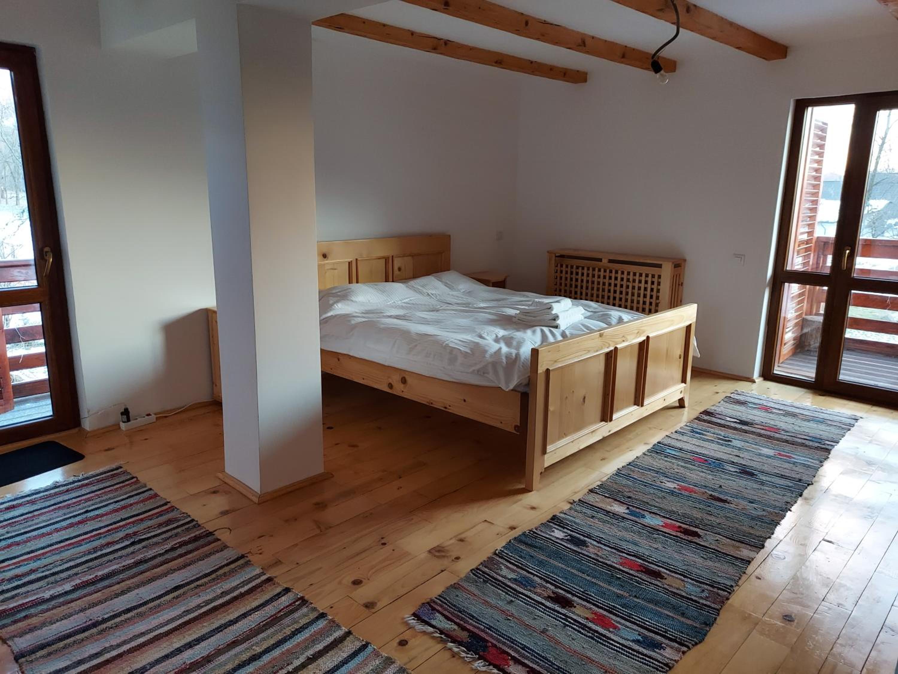 Modern mountain village chalet in Carpathians view 2
