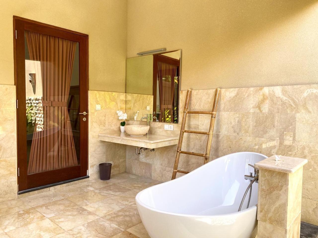 Three Brothers Bali Legian Bungalows & Villas