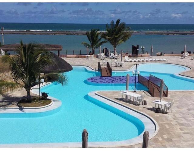 MARUPIARA SUITES- FLAT MURO ALTO