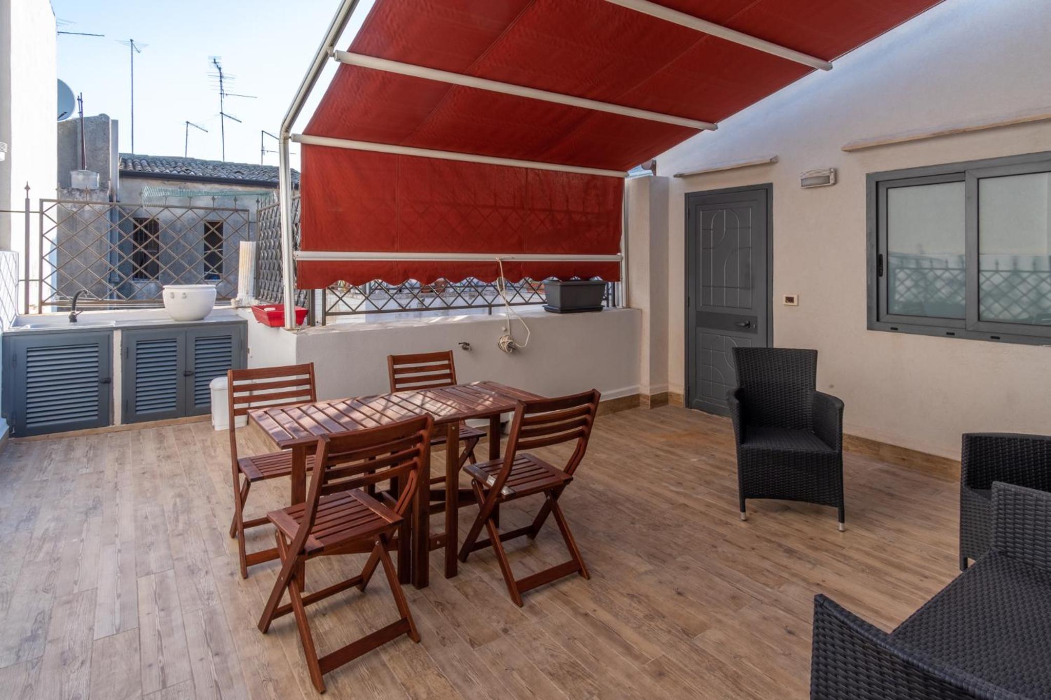 Mansarda Diaz con terrazza a 10 min da Ortigia, fotografia 1