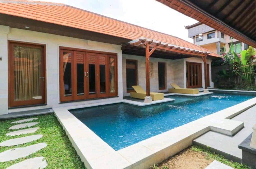 Three Brothers Bali Legian Bungalows & Villas