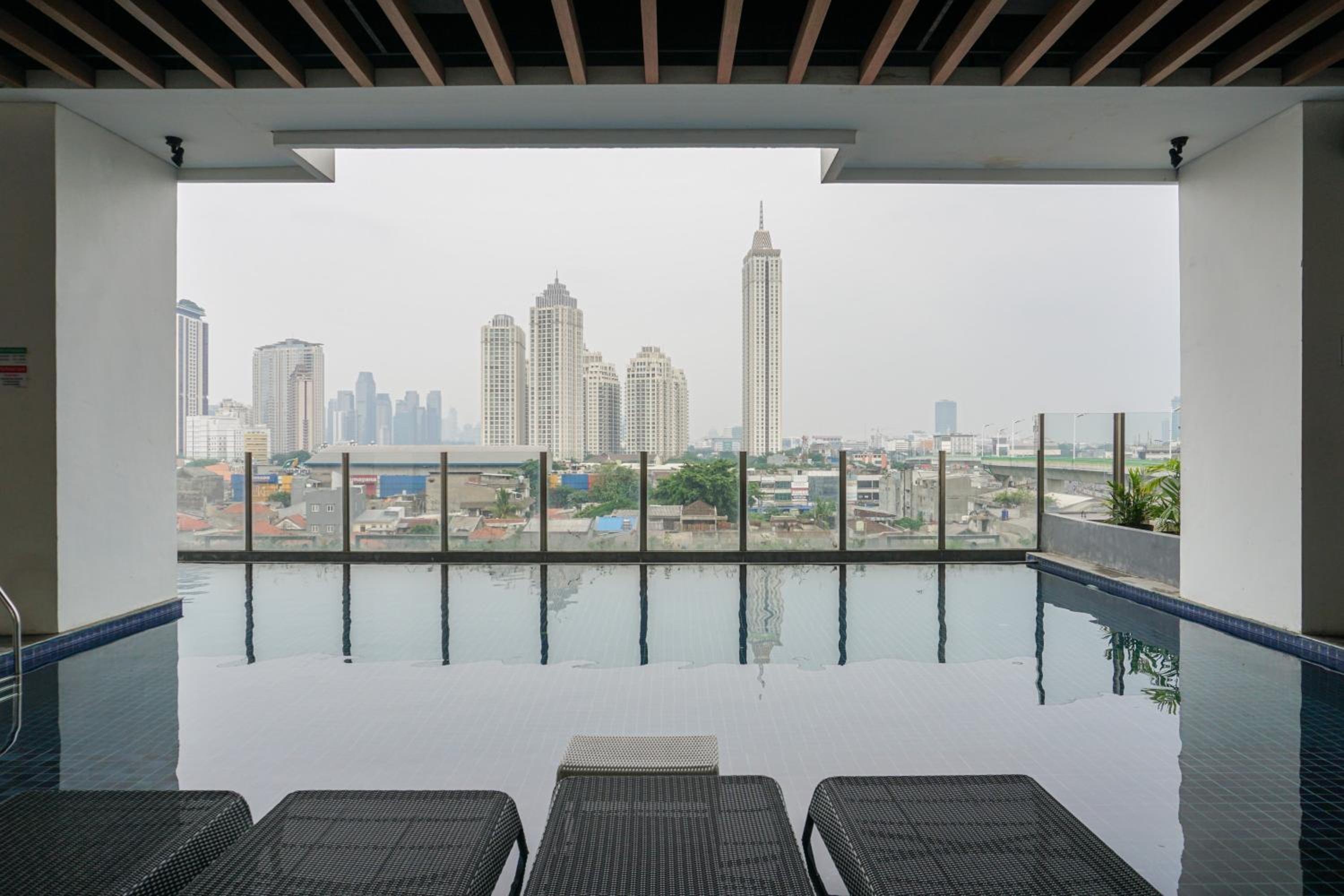 Comfy and Minimalist Studio Kebayoran Icon Apartment By Travelio