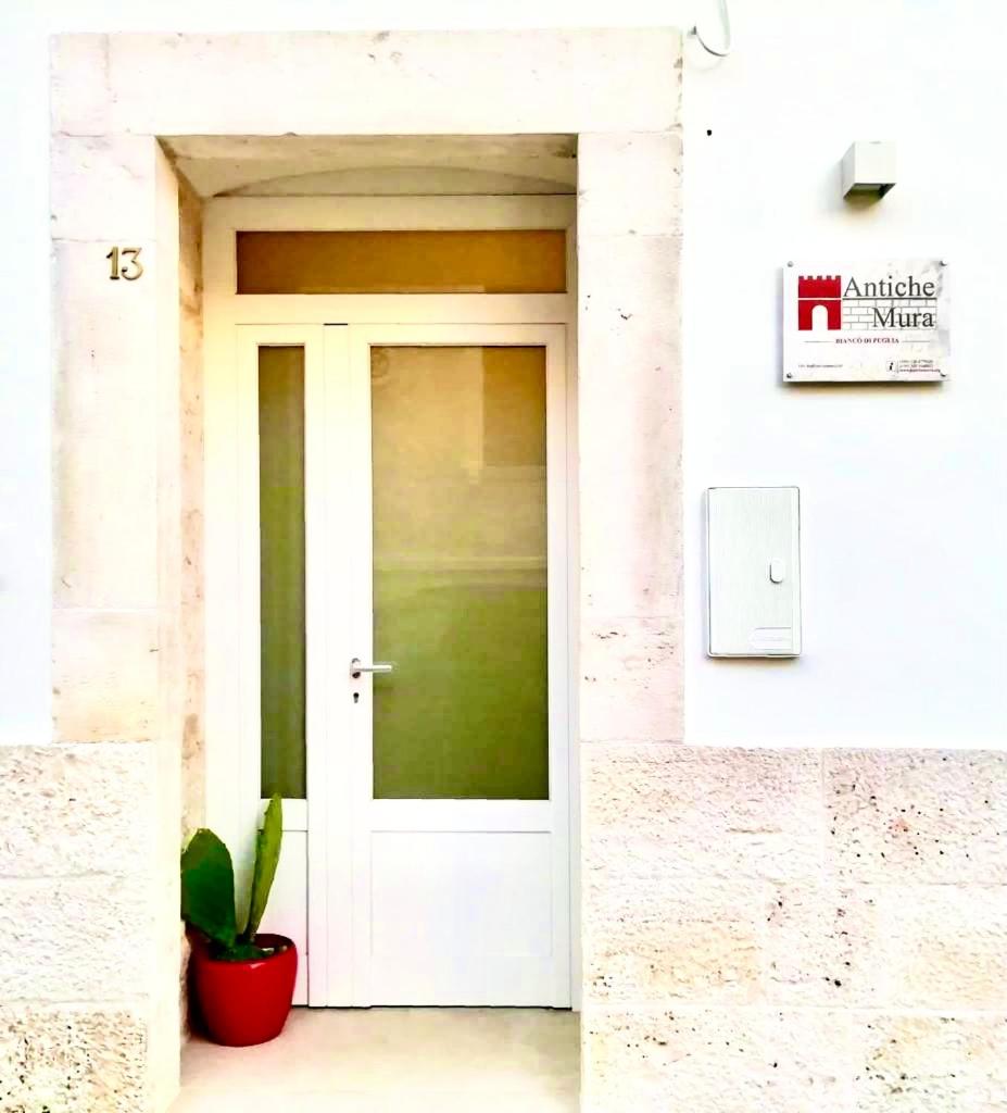 Antiche Mura Apartments"Bianco di Puglia" cucina 1 camera da letto più divano letto view 4