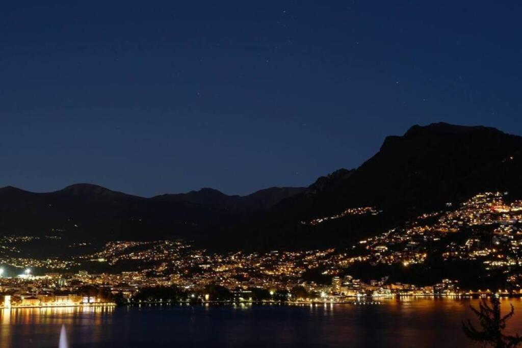 FLAT WITH AMAZING VIEW OVER THE GULF OF LUGANO view 2